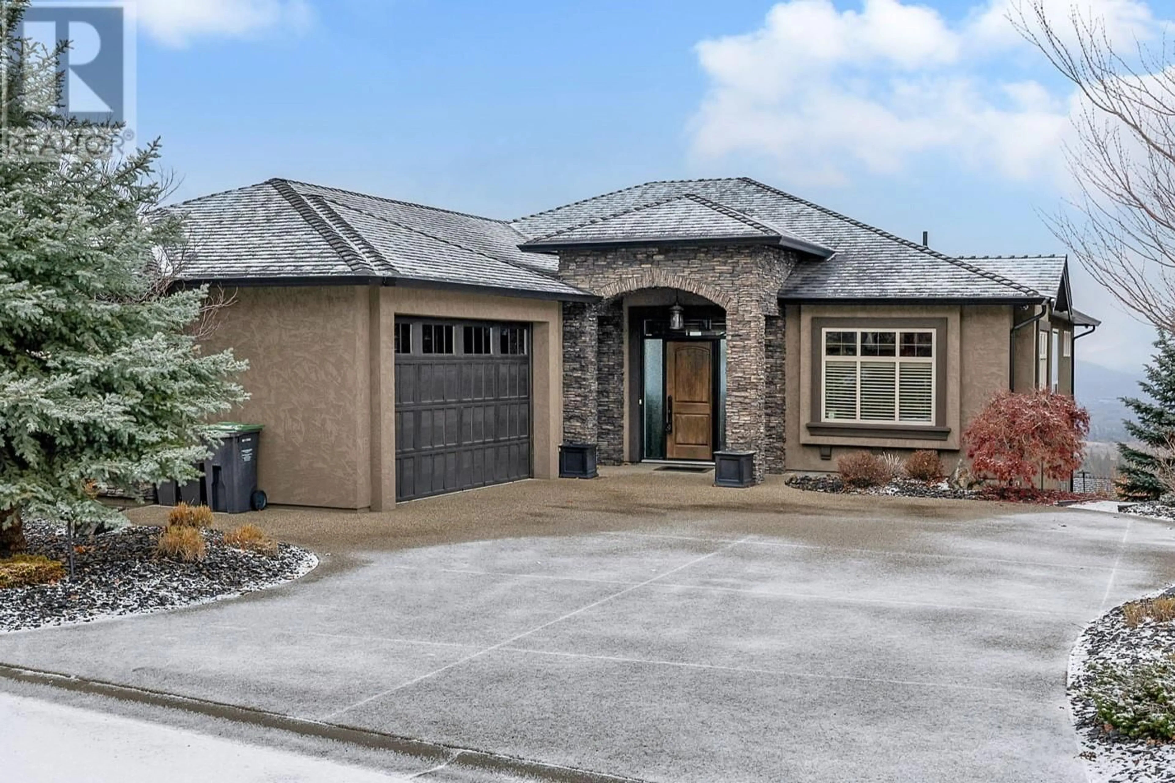 Home with brick exterior material, street for 1014 Hewetson Avenue, Kelowna British Columbia V1W5H8