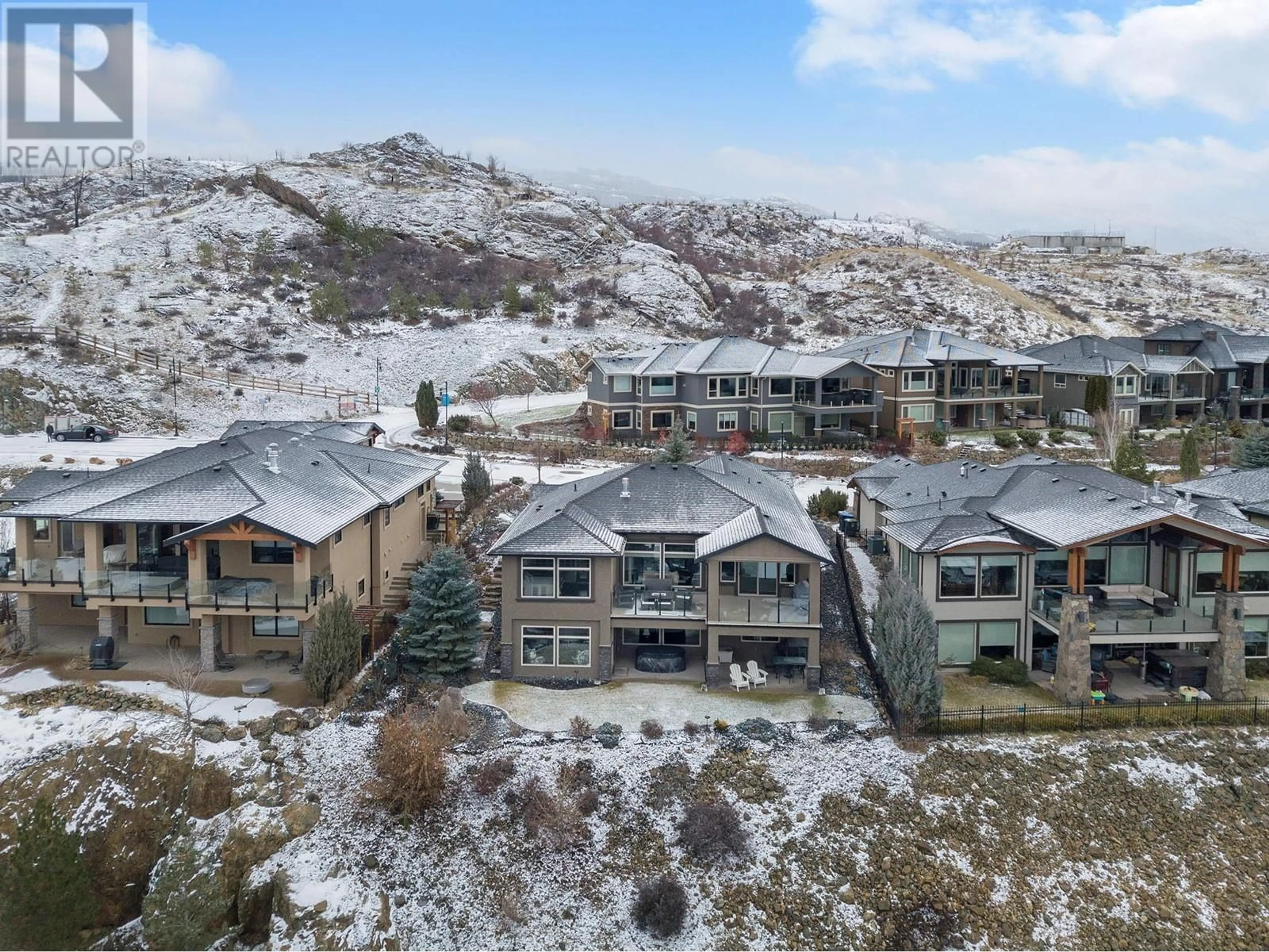 A pic from outside/outdoor area/front of a property/back of a property/a pic from drone, mountain view for 1014 Hewetson Avenue, Kelowna British Columbia V1W5H8