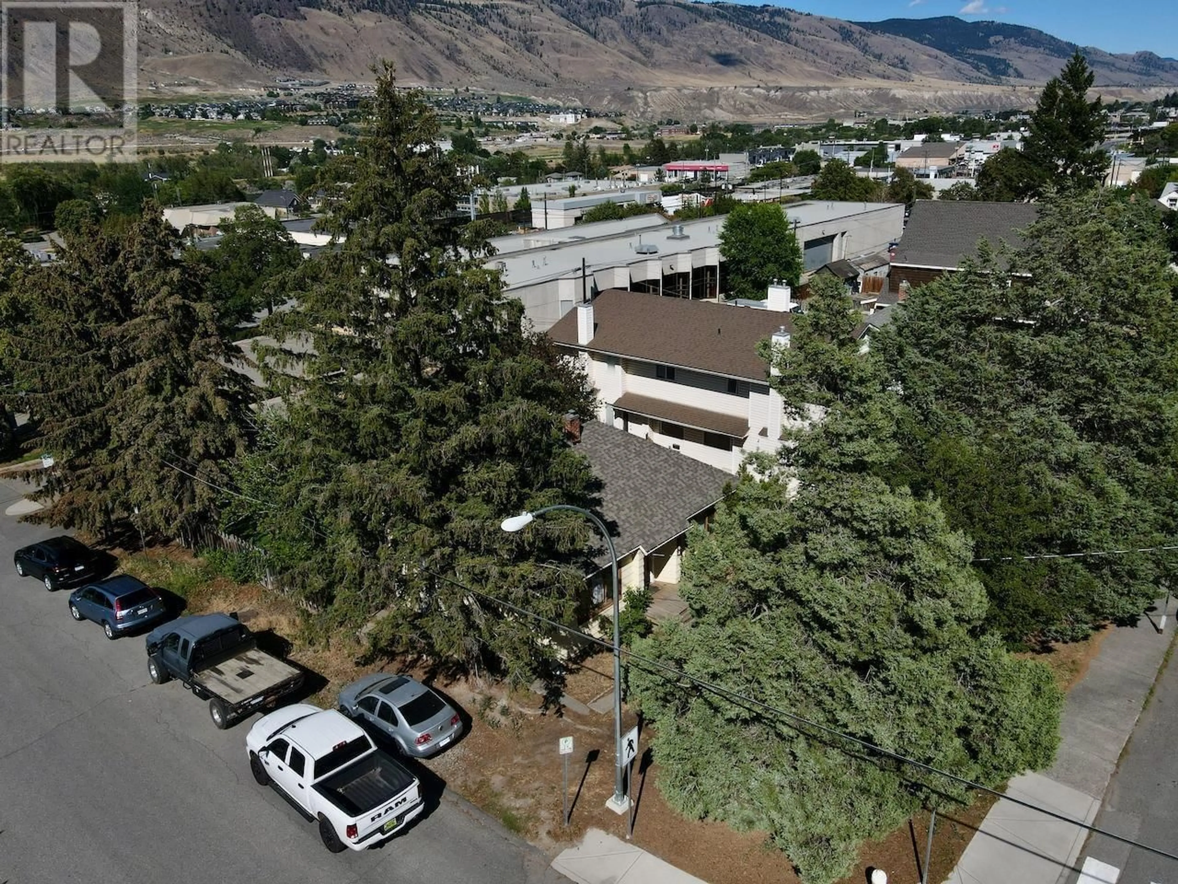 A pic from outside/outdoor area/front of a property/back of a property/a pic from drone, mountain view for 1204 NICOLA Street, Kamloops British Columbia V2C2S5