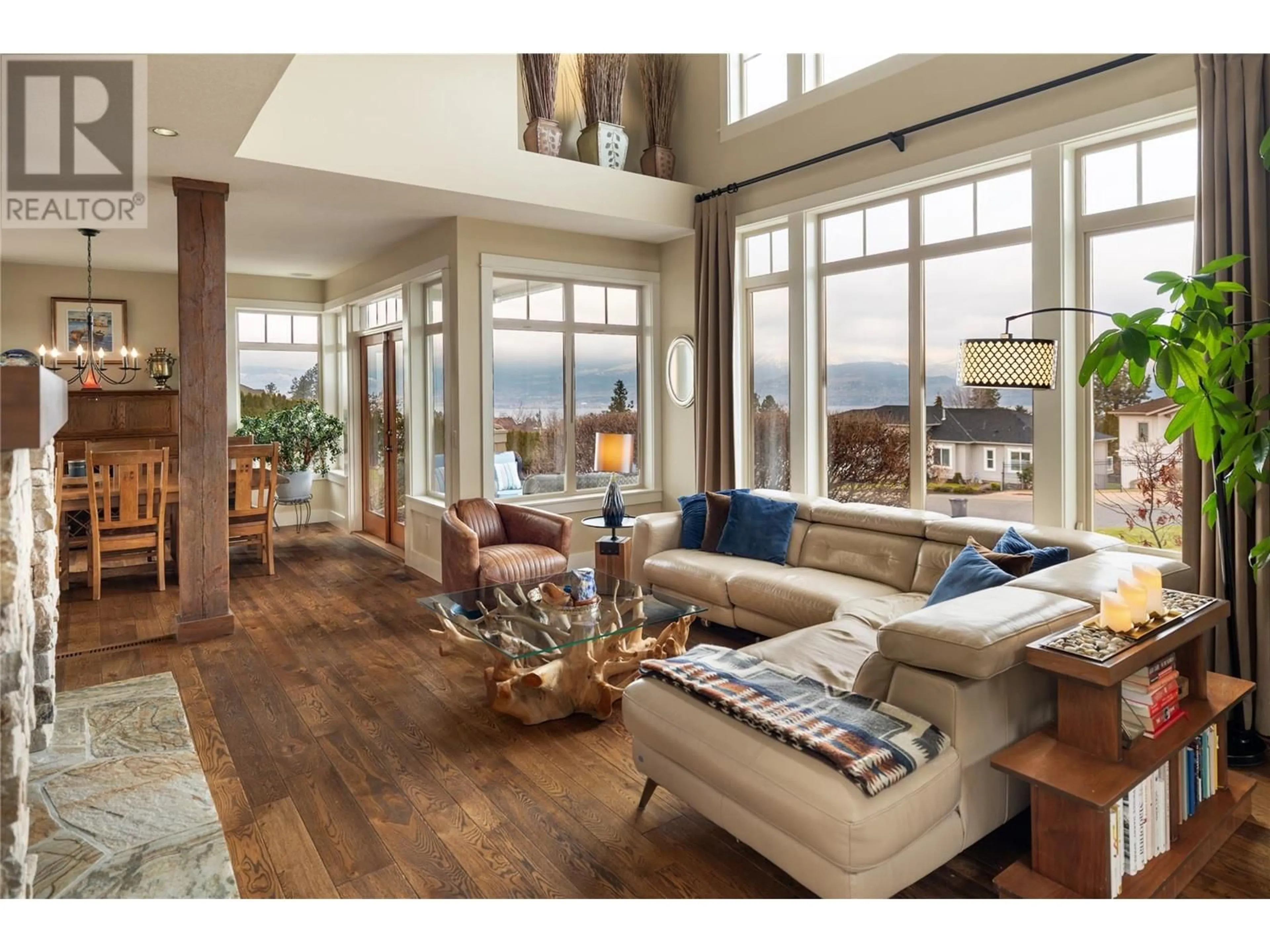 Living room with furniture, wood/laminate floor for 337 Tanager Drive, Kelowna British Columbia V1W4T6