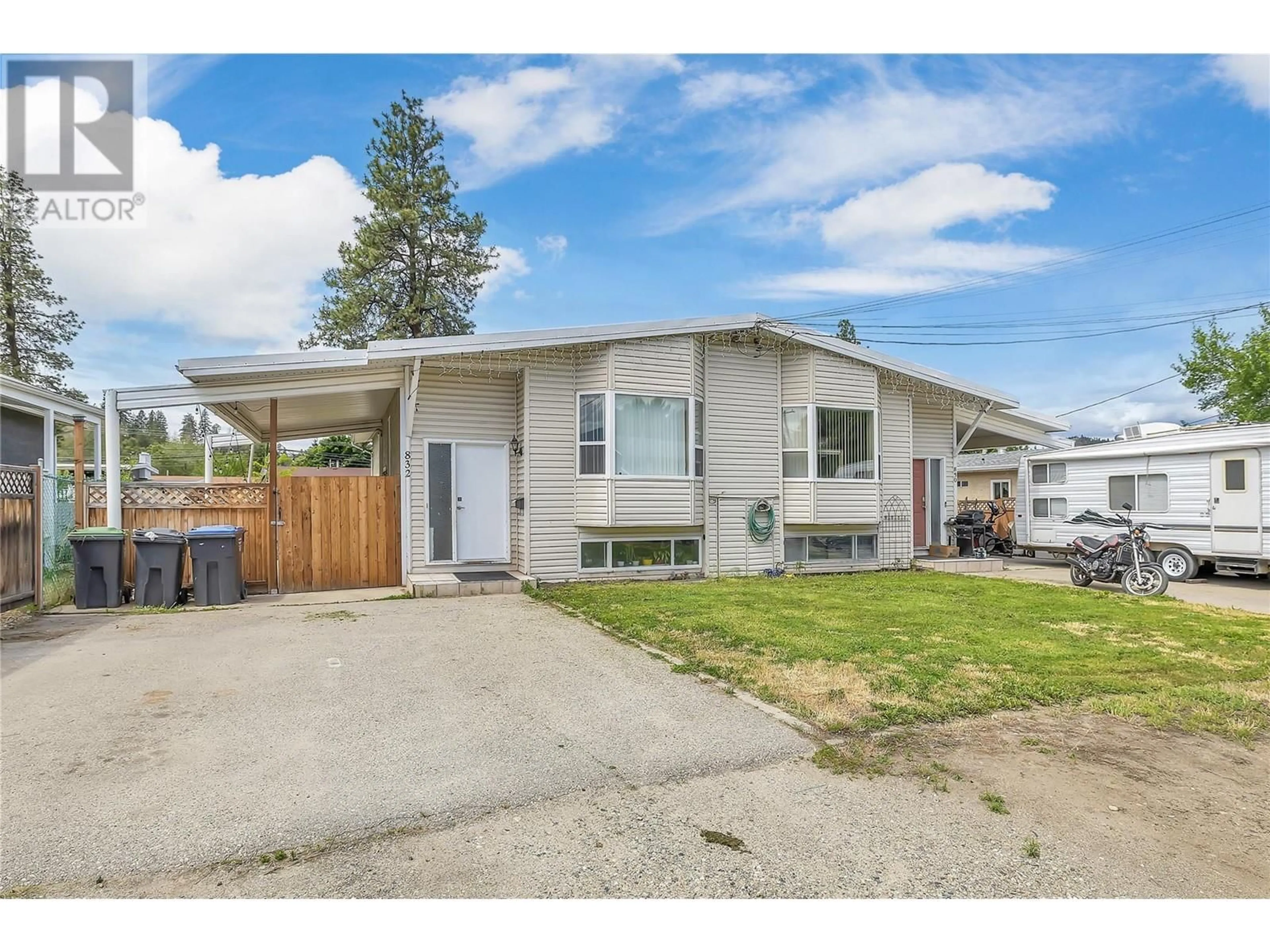 Home with vinyl exterior material, street for 830/832 Irma Road, Kelowna British Columbia V1X3Z9