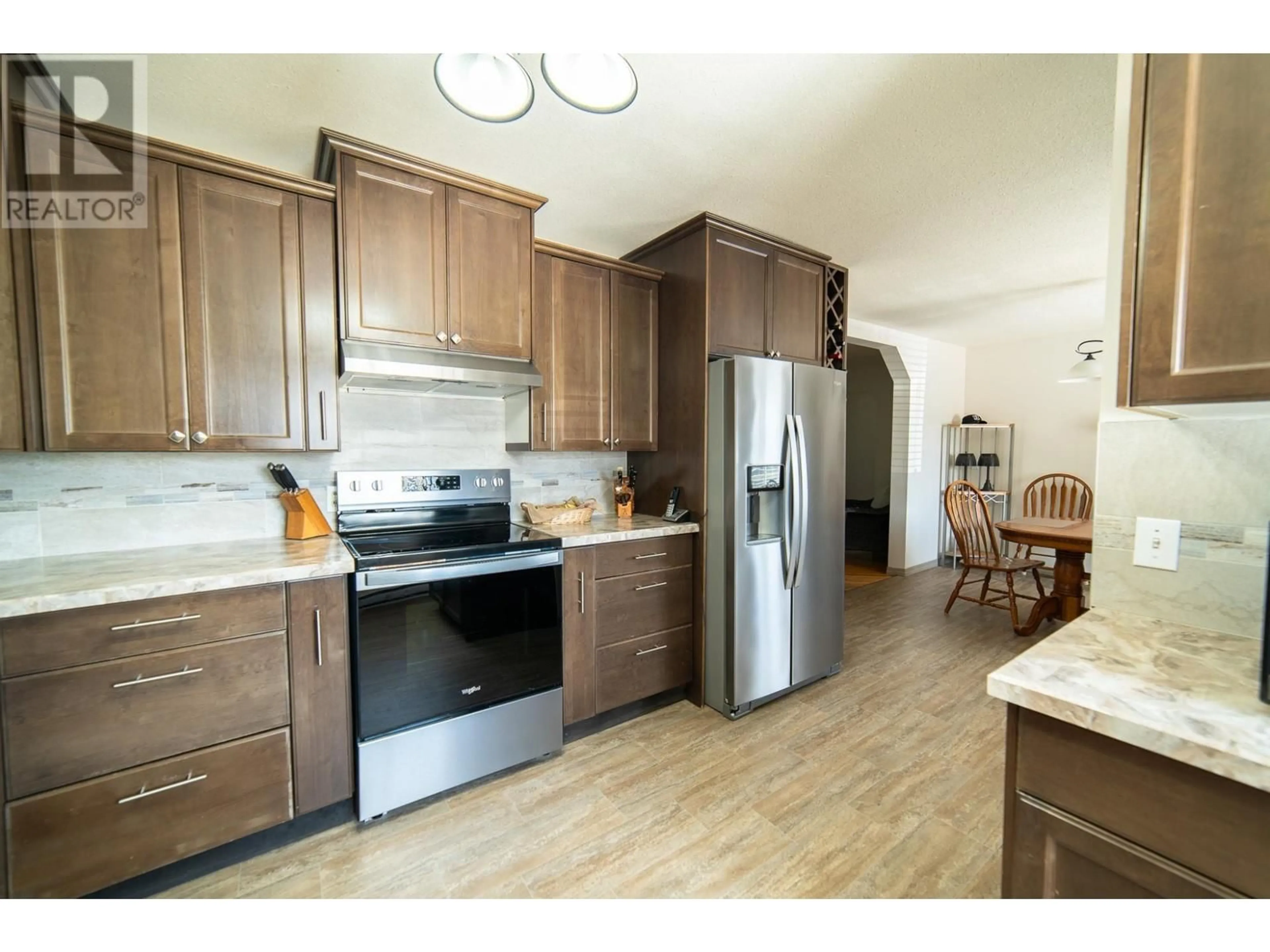 Standard kitchen, wood/laminate floor for 3706 3 Highway, Creston British Columbia V0B1K0