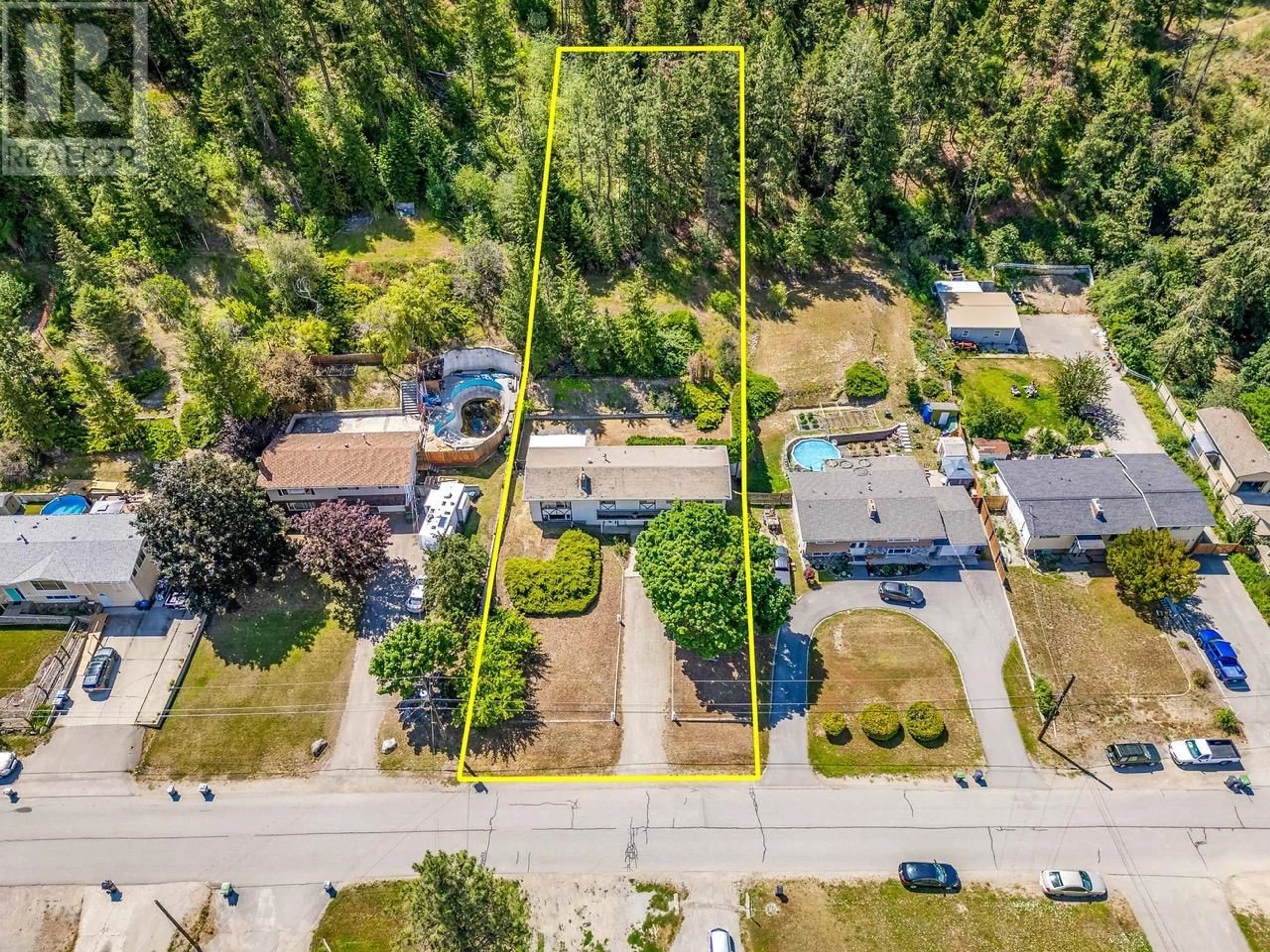 A pic from outside/outdoor area/front of a property/back of a property/a pic from drone, street for 1445 Ponderosa Road, West Kelowna British Columbia V1Z1M9