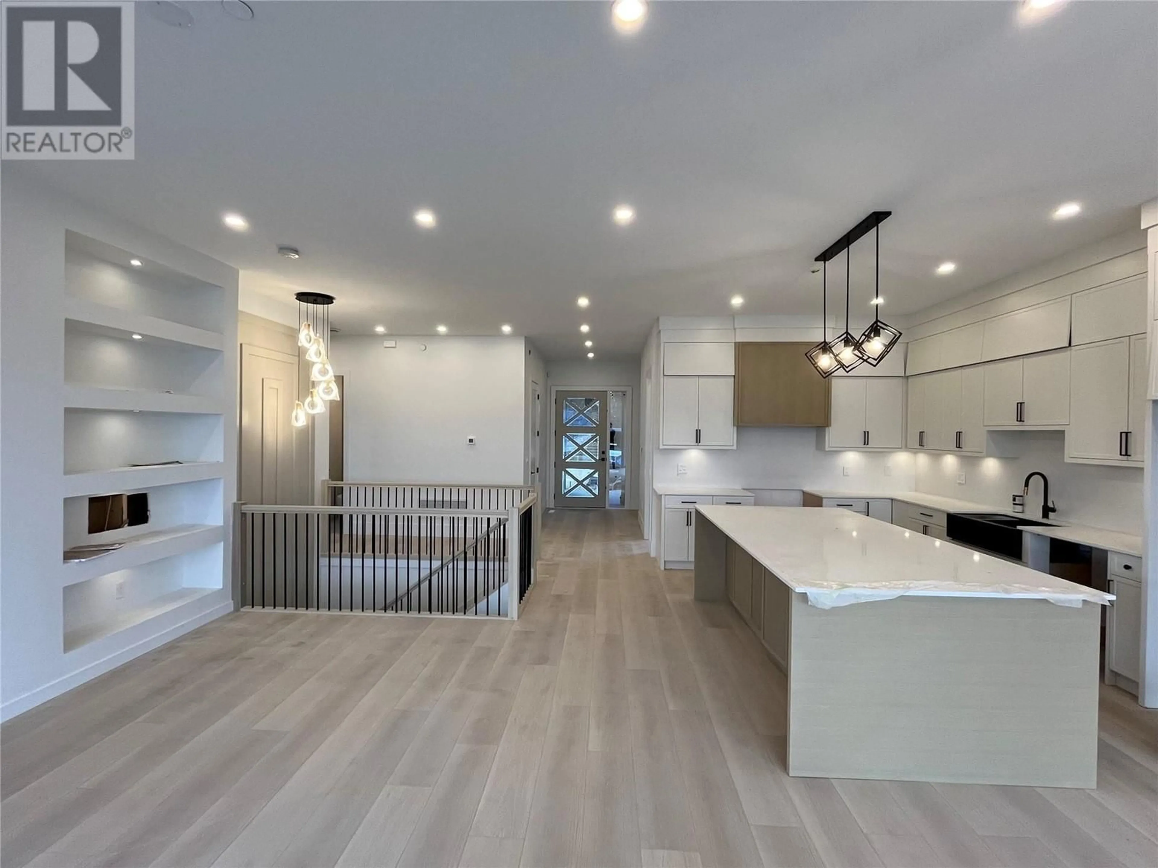 Open concept kitchen, unknown for 8916 Tavistock Road, Vernon British Columbia V1H2L4