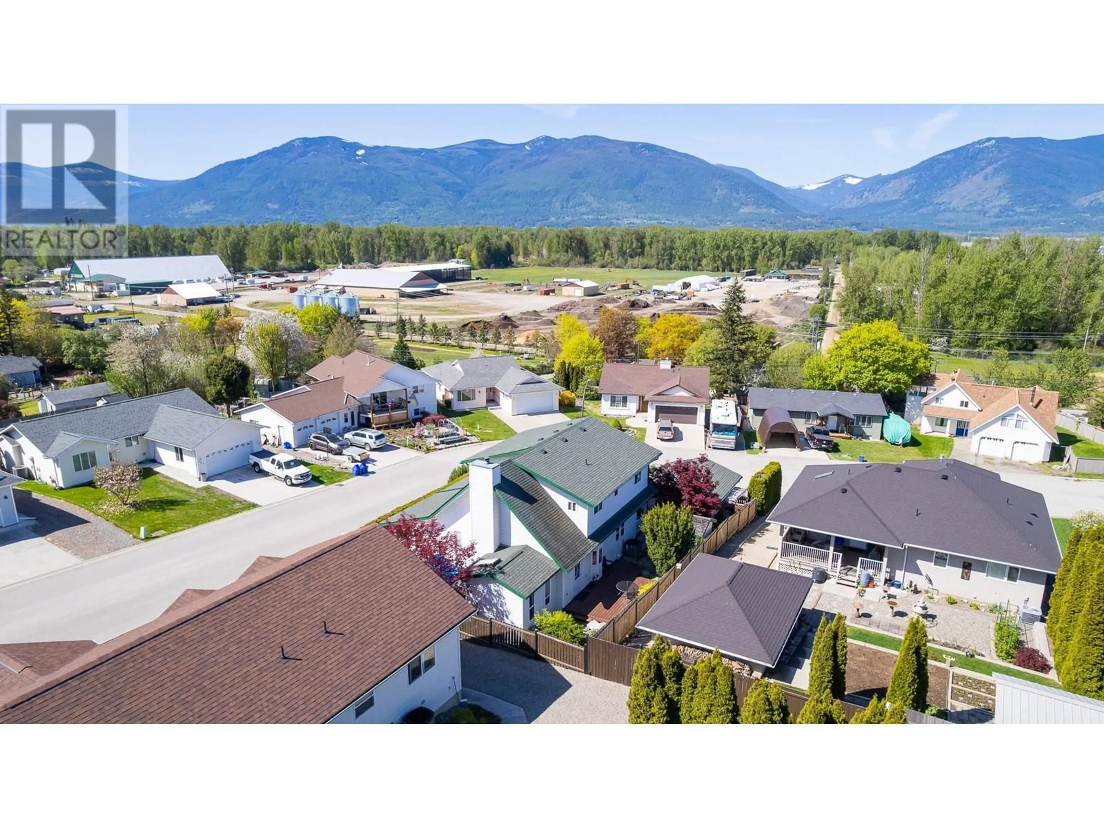 A pic from outside/outdoor area/front of a property/back of a property/a pic from drone, mountain view for 304 DUGAN STREET, Creston British Columbia V0B1G3