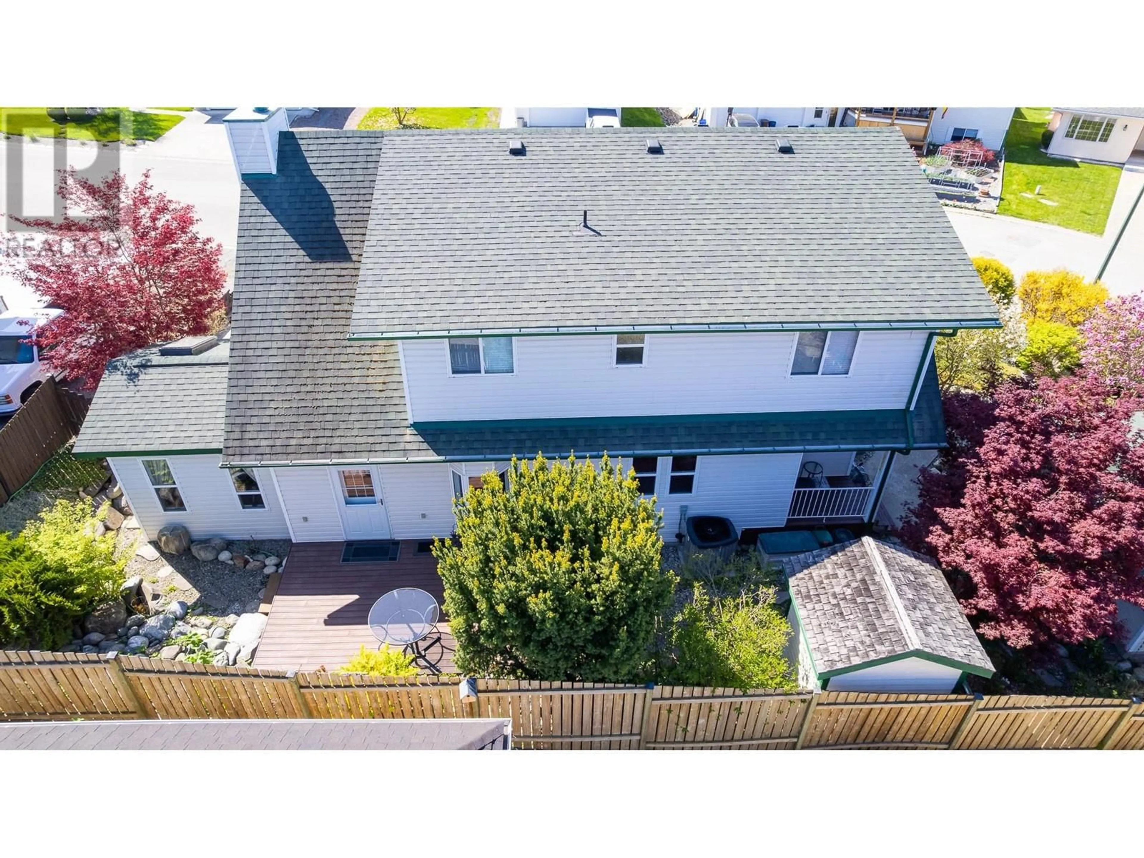 A pic from outside/outdoor area/front of a property/back of a property/a pic from drone, street for 304 DUGAN STREET, Creston British Columbia V0B1G3