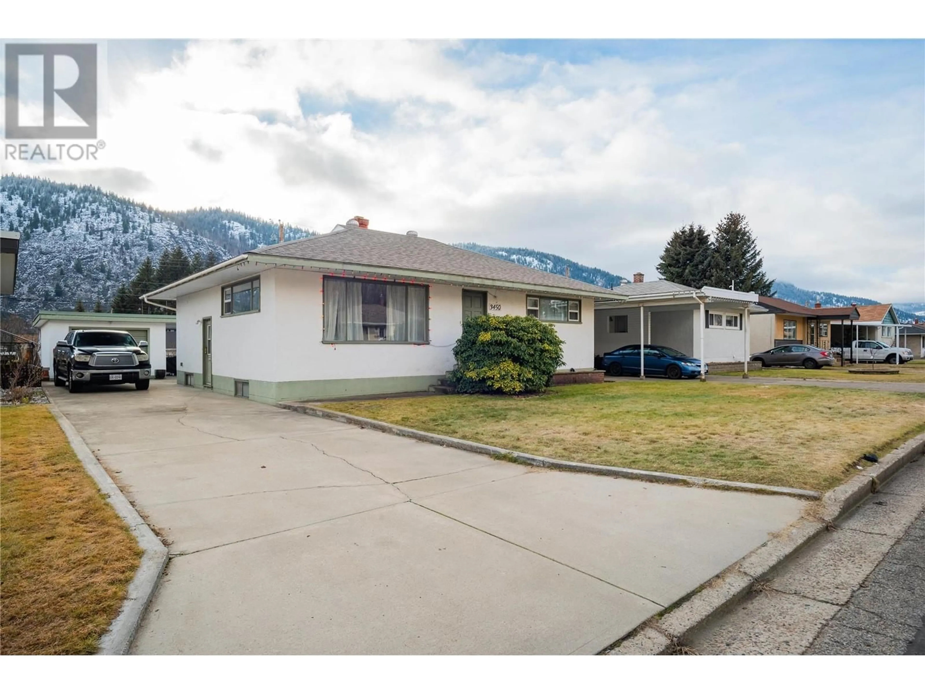 Home with vinyl exterior material, mountain view for 3450 Aster Drive, Trail British Columbia V1R2X3