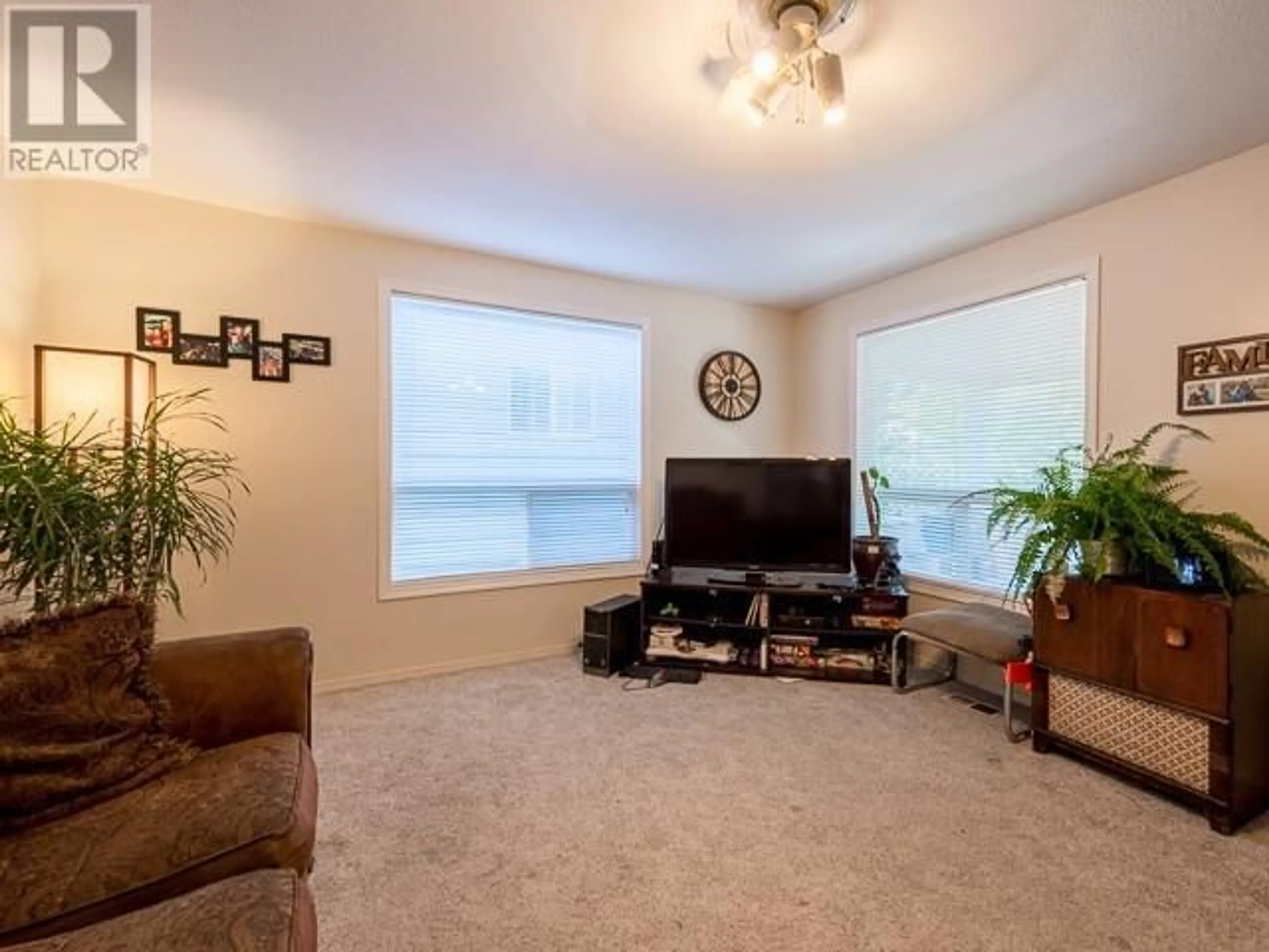 Living room with furniture, carpet floor for 962 PINE Street, Kamloops British Columbia V2C3A2