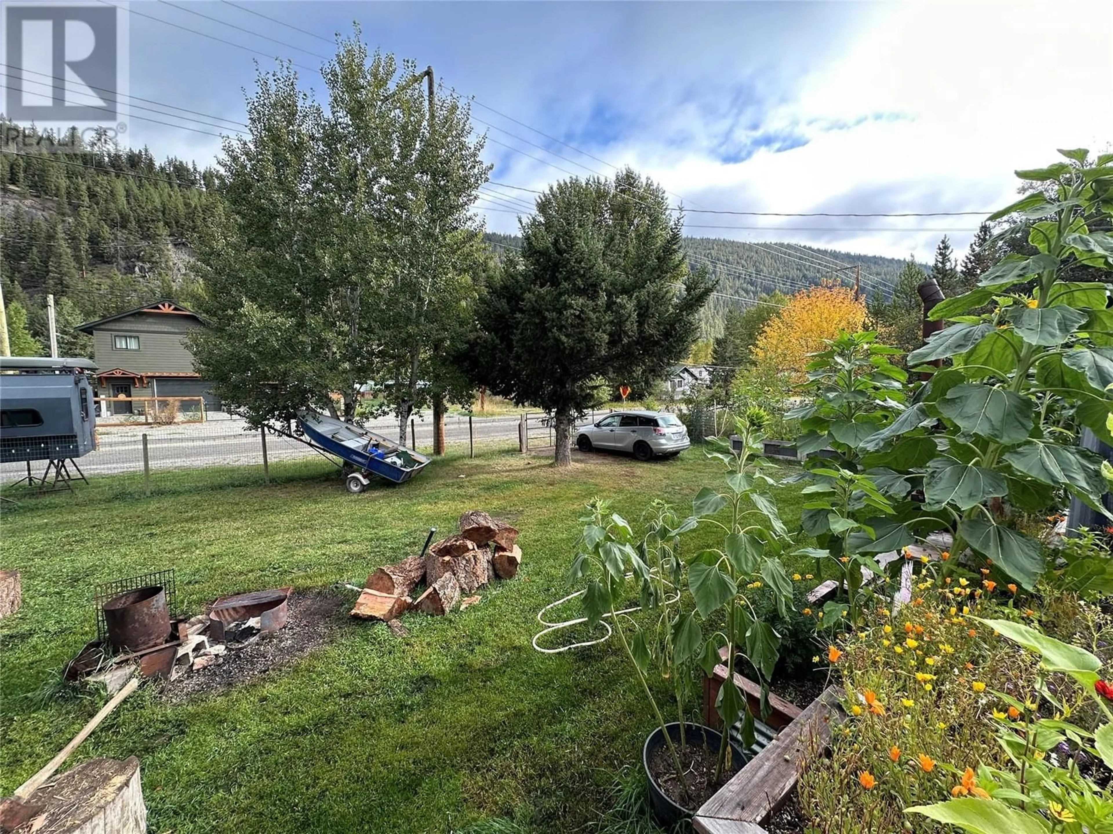 A pic from outside/outdoor area/front of a property/back of a property/a pic from drone, forest/trees view for 1881 MAIN STREET, Coalmont-Tulameen British Columbia V0X1G0