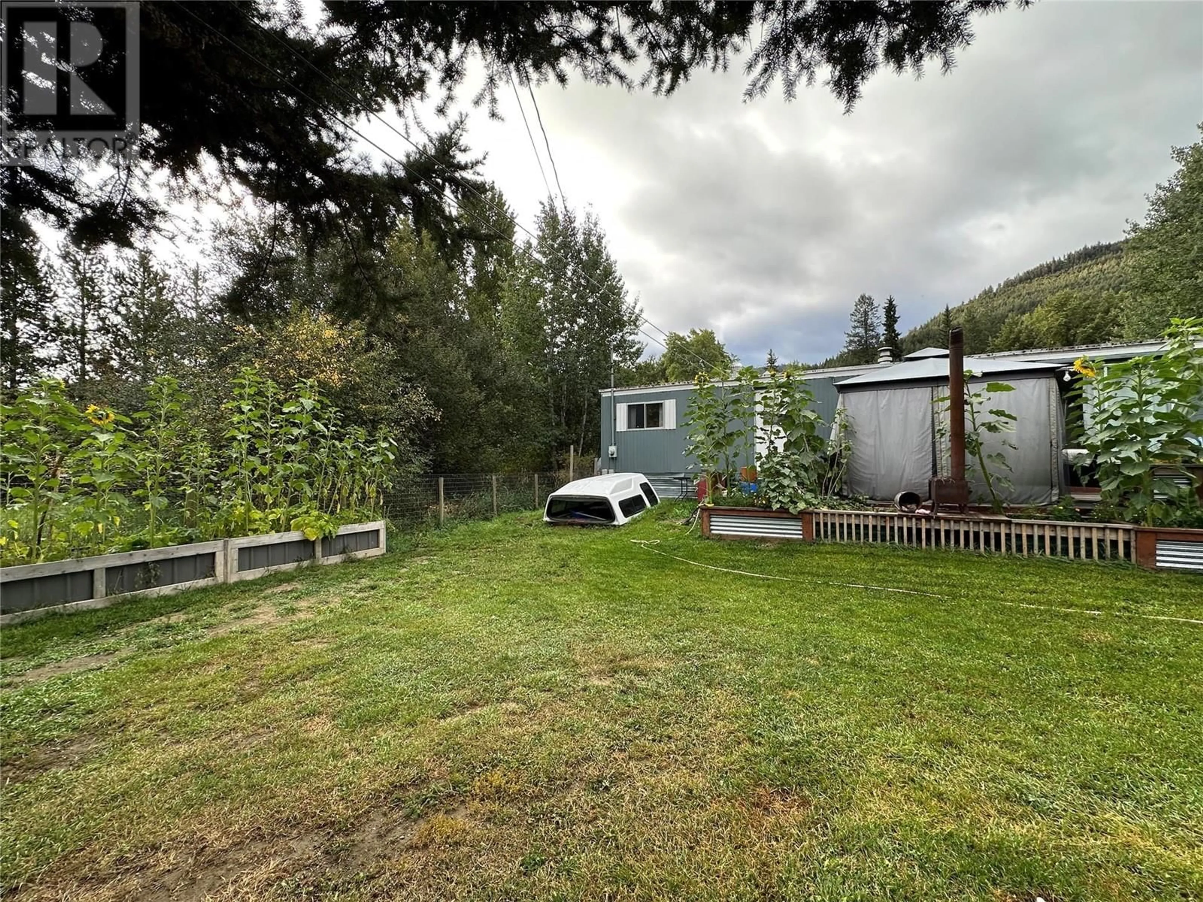 A pic from outside/outdoor area/front of a property/back of a property/a pic from drone, forest/trees view for 1881 MAIN STREET, Coalmont-Tulameen British Columbia V0X1G0