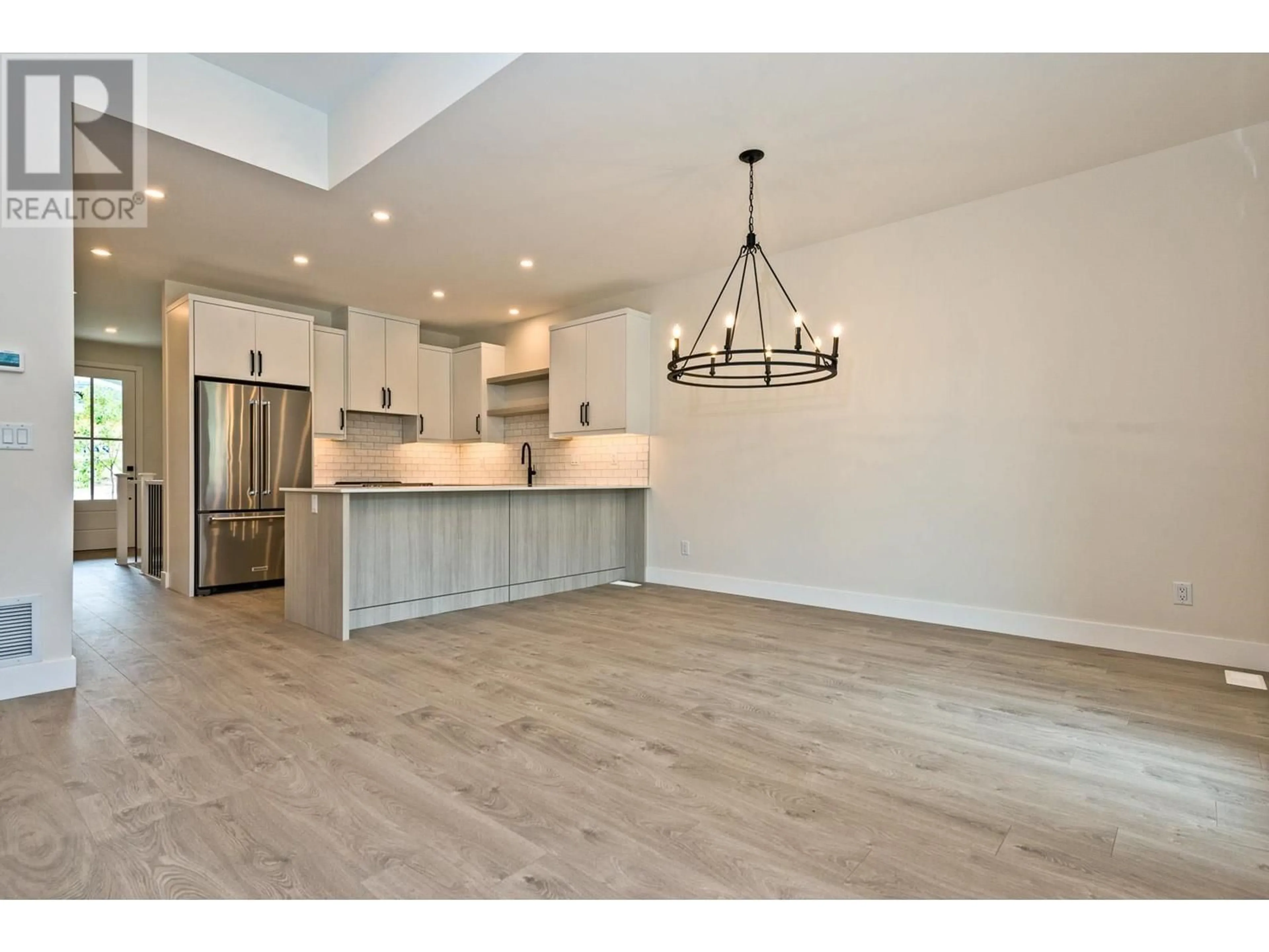 Open concept kitchen, wood/laminate floor for 8000 VEDETTE Drive Unit# 2, Osoyoos British Columbia V0H1V2