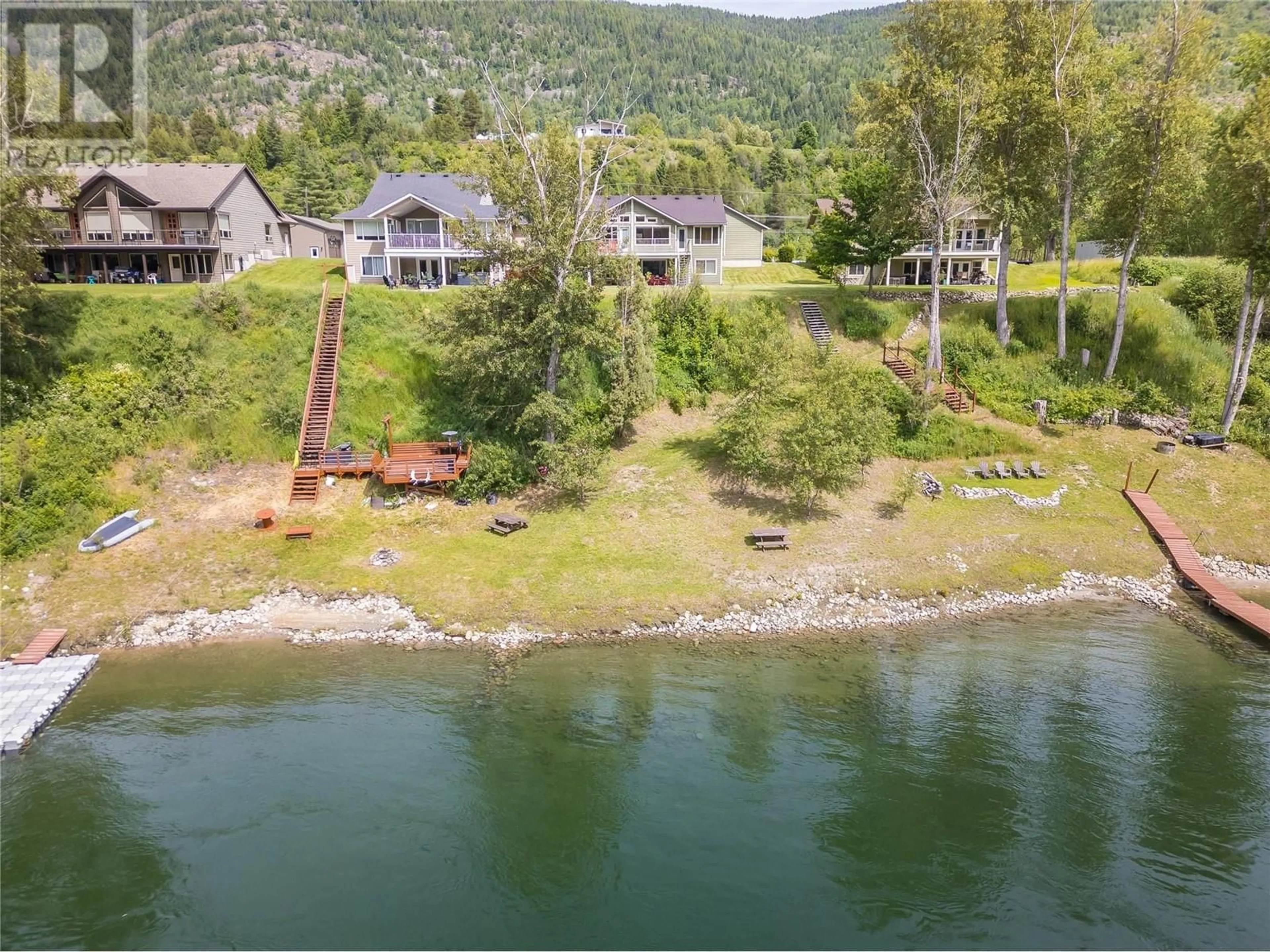 A pic from outside/outdoor area/front of a property/back of a property/a pic from drone, water/lake/river/ocean view for 755 WATERLOO ROAD, Castlegar British Columbia V1N4K8
