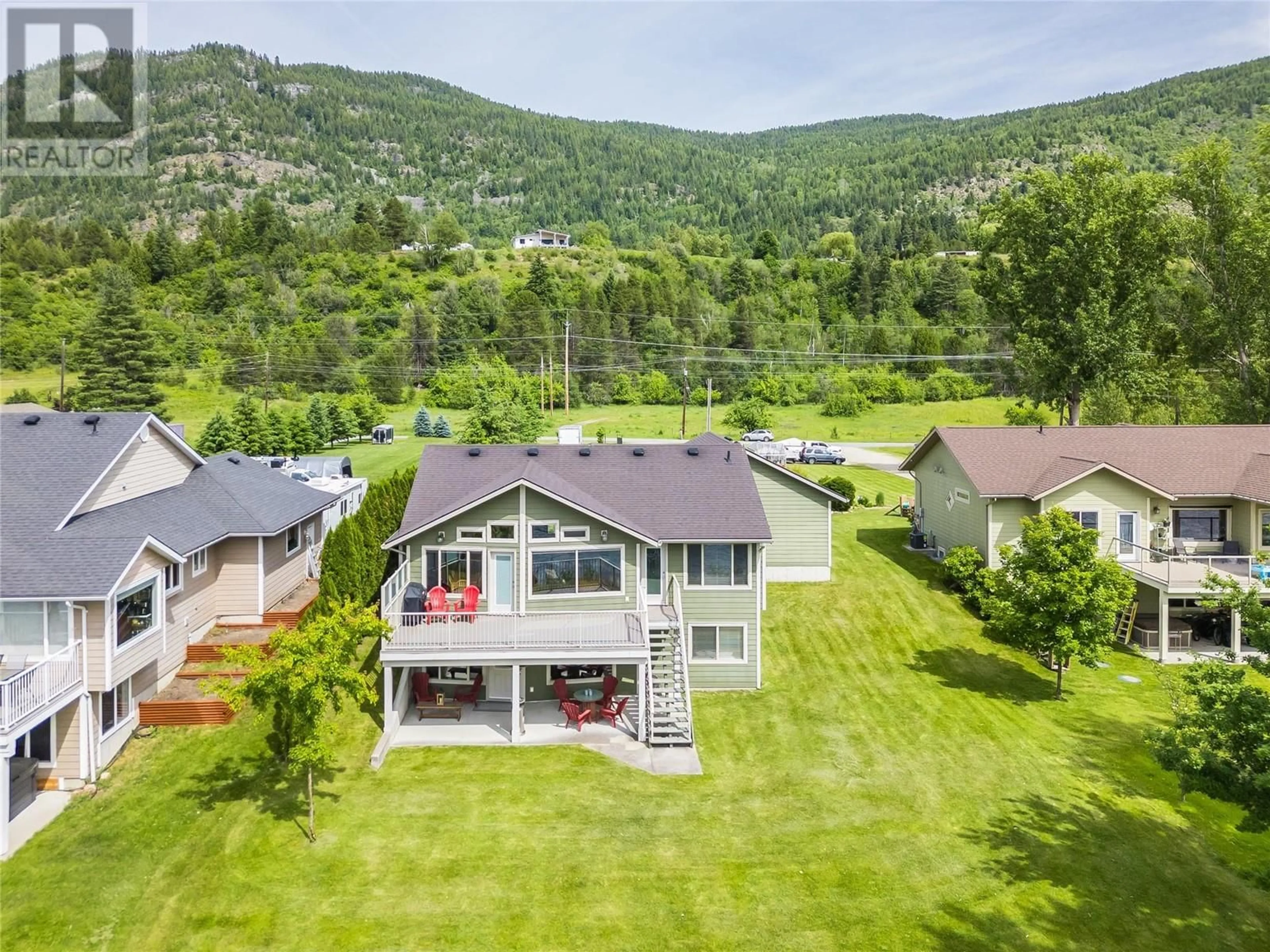 A pic from outside/outdoor area/front of a property/back of a property/a pic from drone, mountain view for 755 WATERLOO ROAD, Castlegar British Columbia V1N4K8