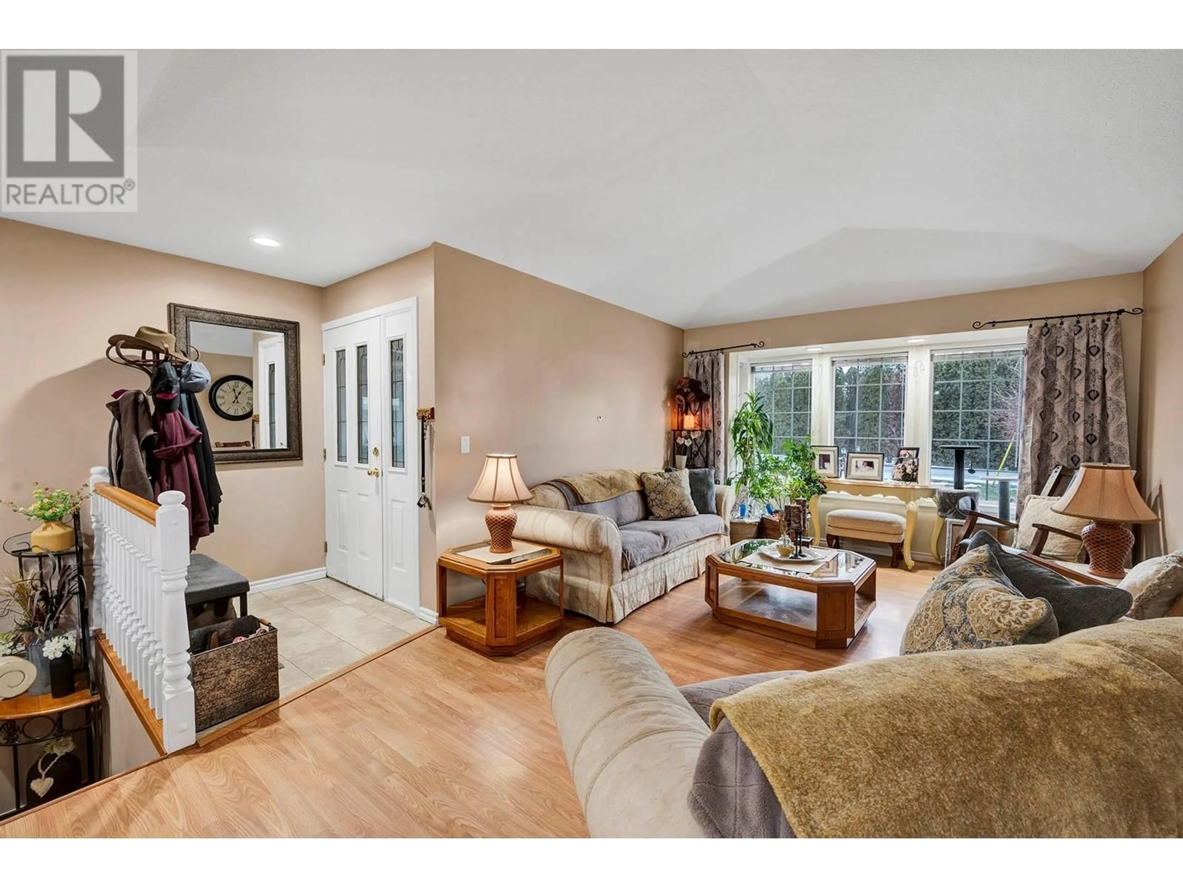 Living room with furniture, wood/laminate floor for 380 MATTOCH MCKEAGUE ROAD, Kamloops British Columbia V2H1L1