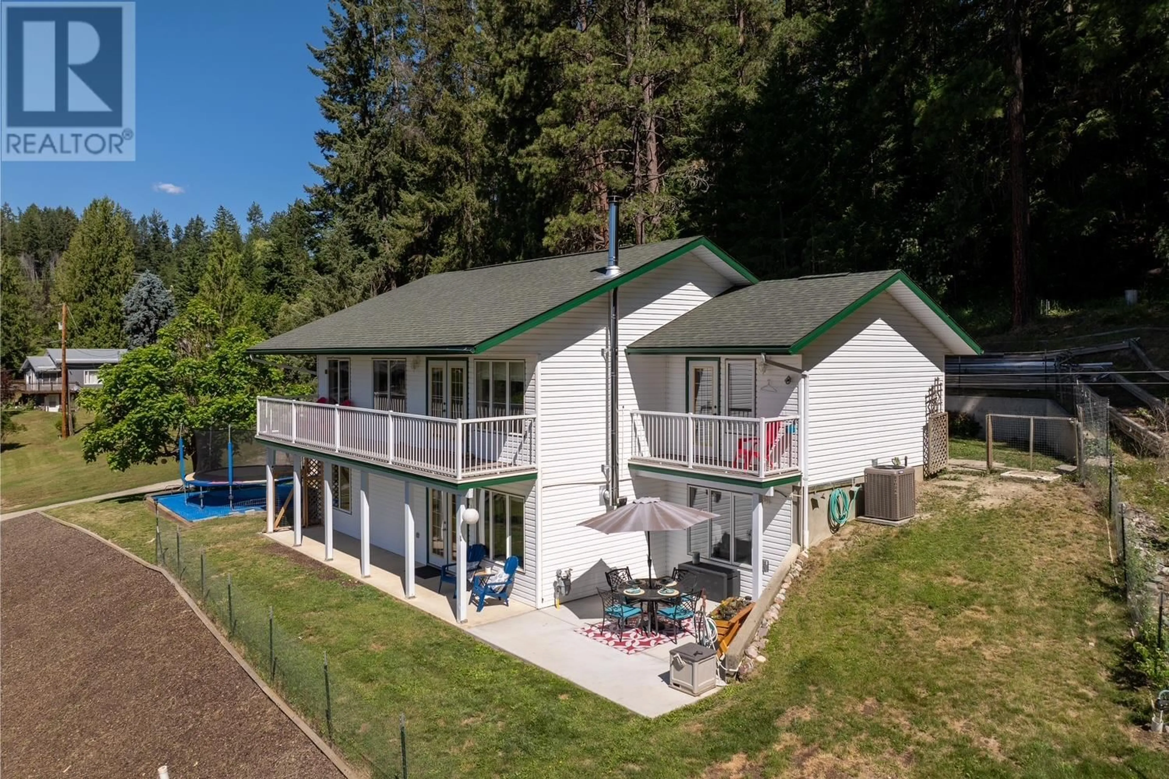 A pic from outside/outdoor area/front of a property/back of a property/a pic from drone, water/lake/river/ocean view for 410 27TH  N Avenue, Erickson British Columbia V0B1G1