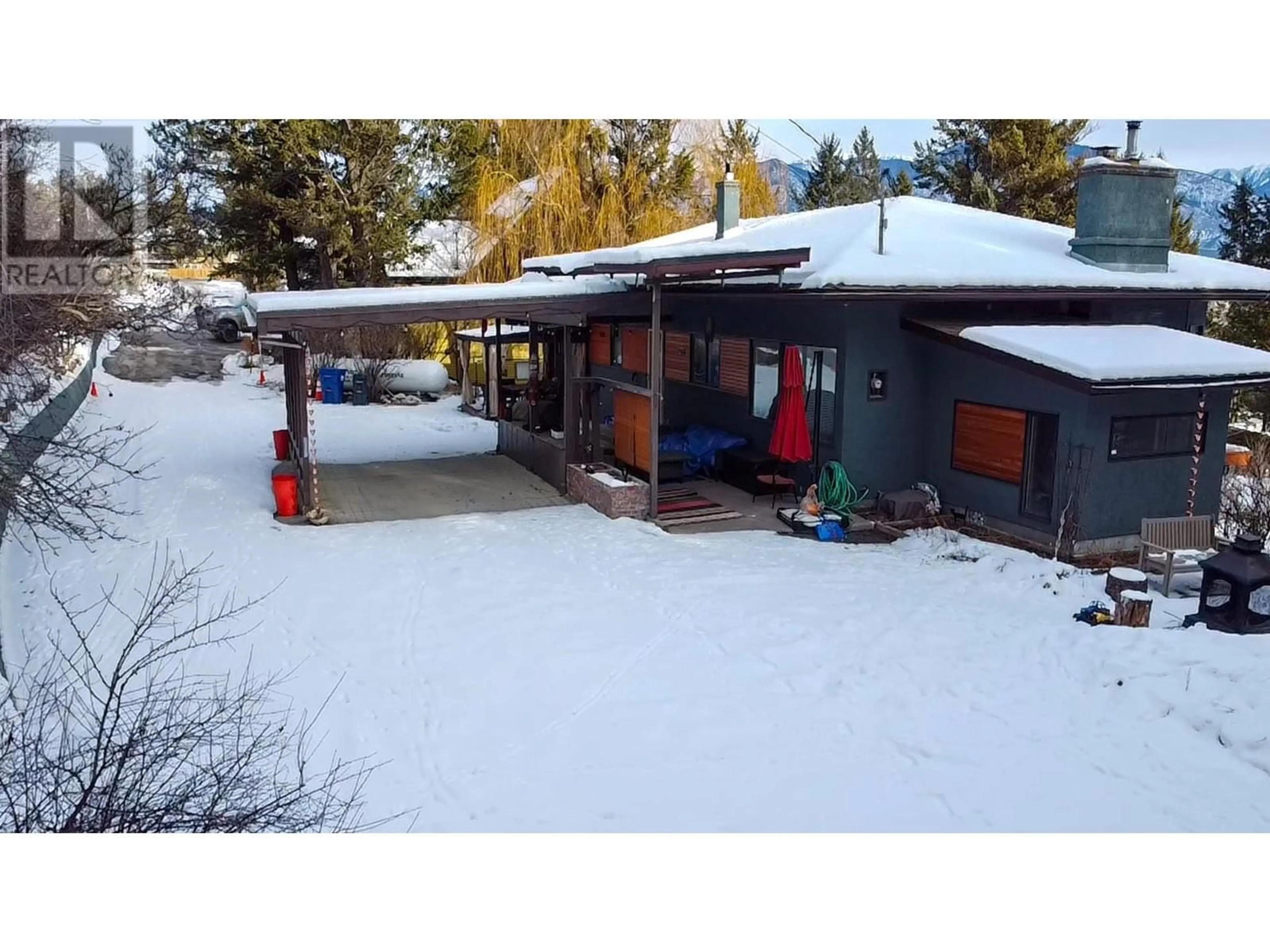 A pic from outside/outdoor area/front of a property/back of a property/a pic from drone, street for 1325 12 Avenue, Invermere British Columbia V0A1K0