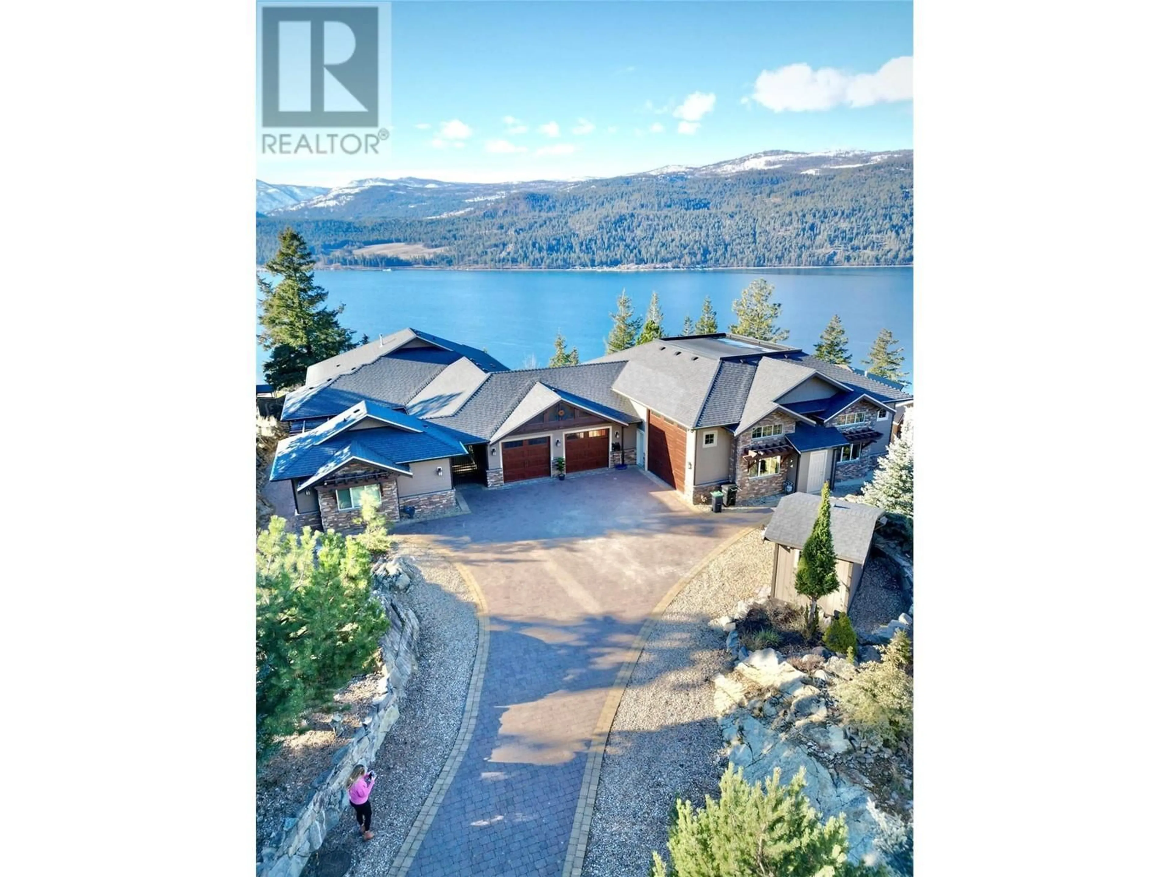 A pic from outside/outdoor area/front of a property/back of a property/a pic from drone, water/lake/river/ocean view for 69 Swallows Place, Vernon British Columbia V1H1F4