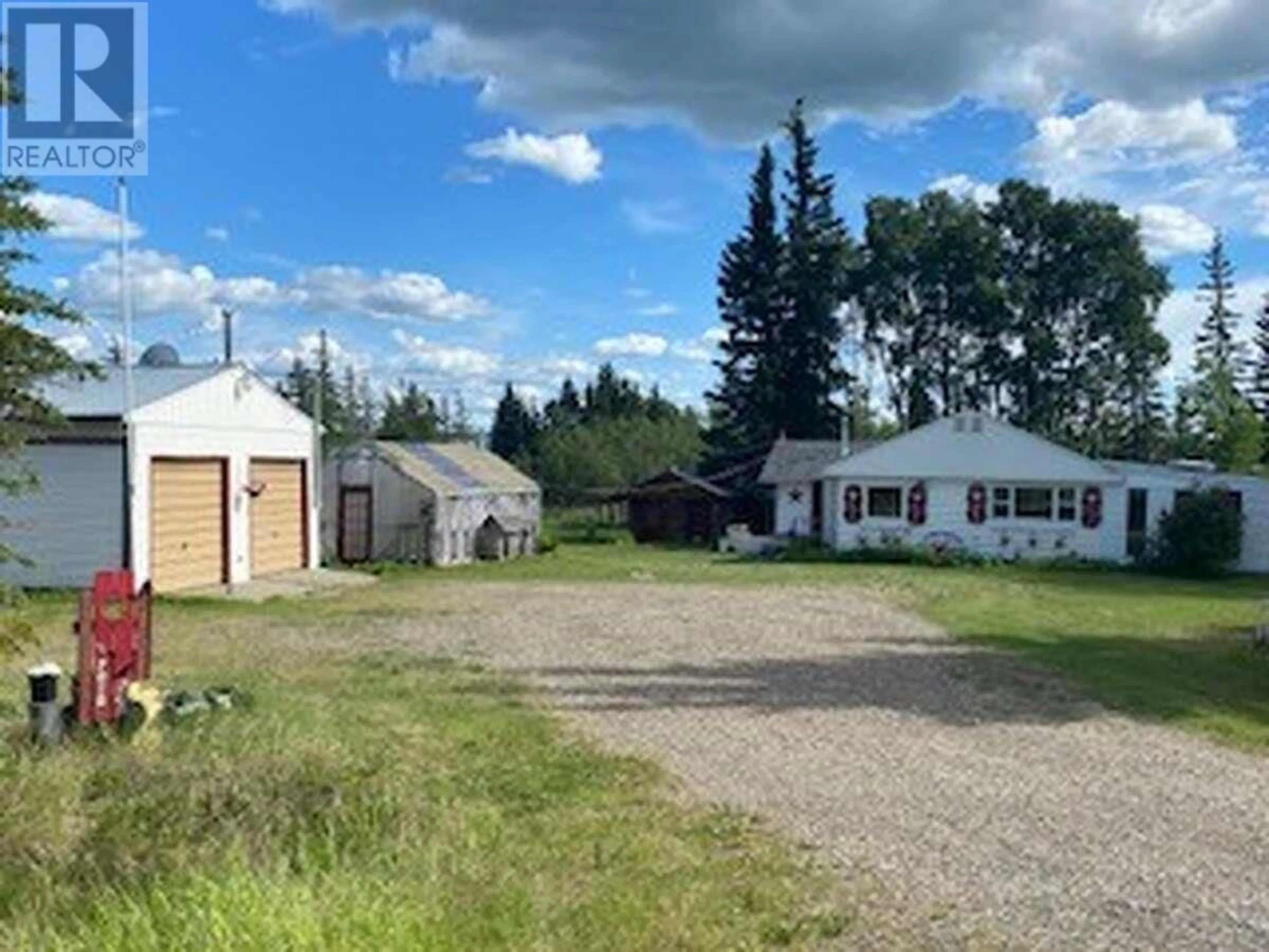 A pic from outside/outdoor area/front of a property/back of a property/a pic from drone, unknown for 7018 225 Road, Dawson Creek British Columbia V1G4E7