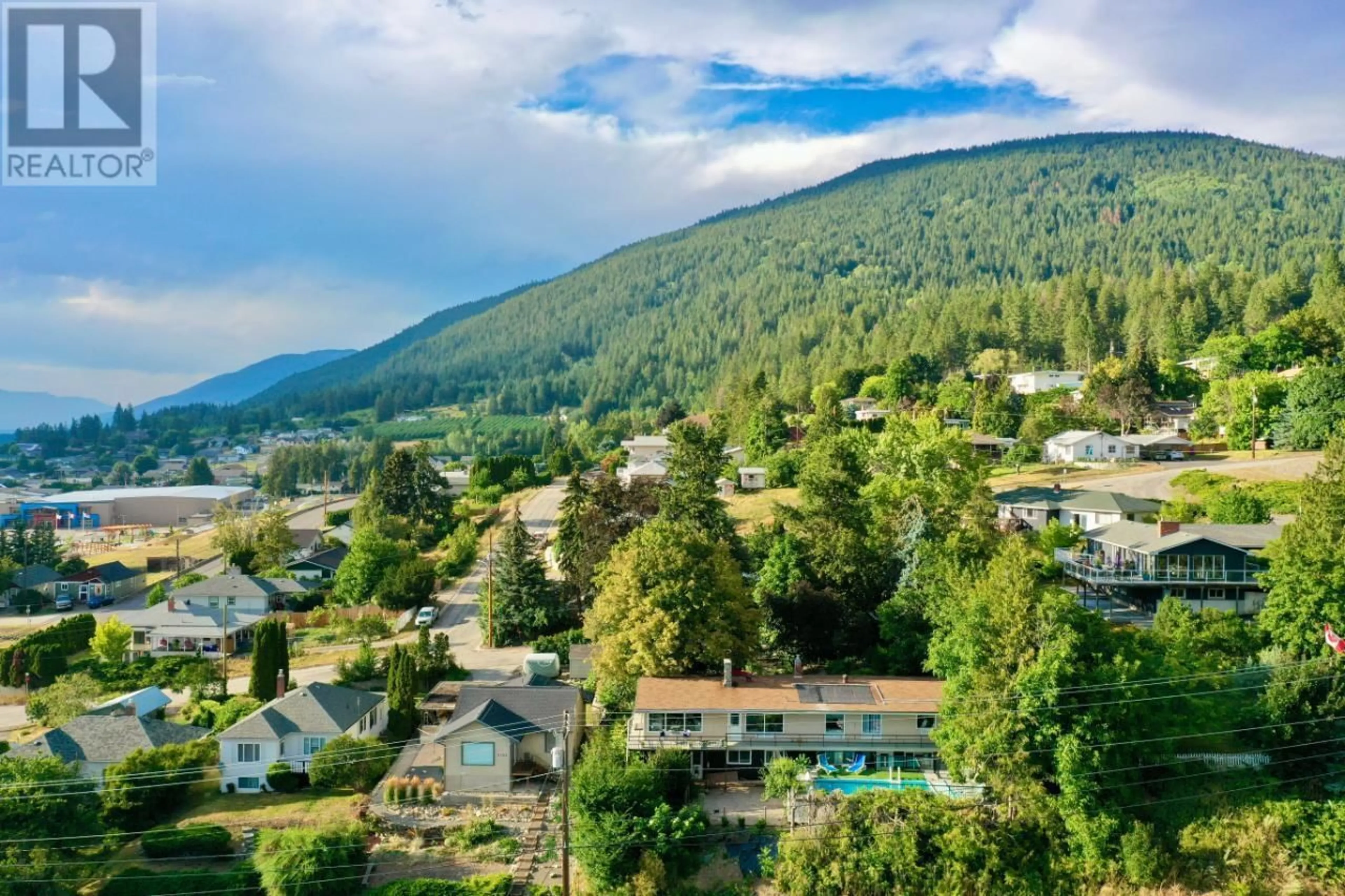 A pic from outside/outdoor area/front of a property/back of a property/a pic from drone, mountain view for 2108 CRAWFORD STREET, Creston British Columbia V0B1G5