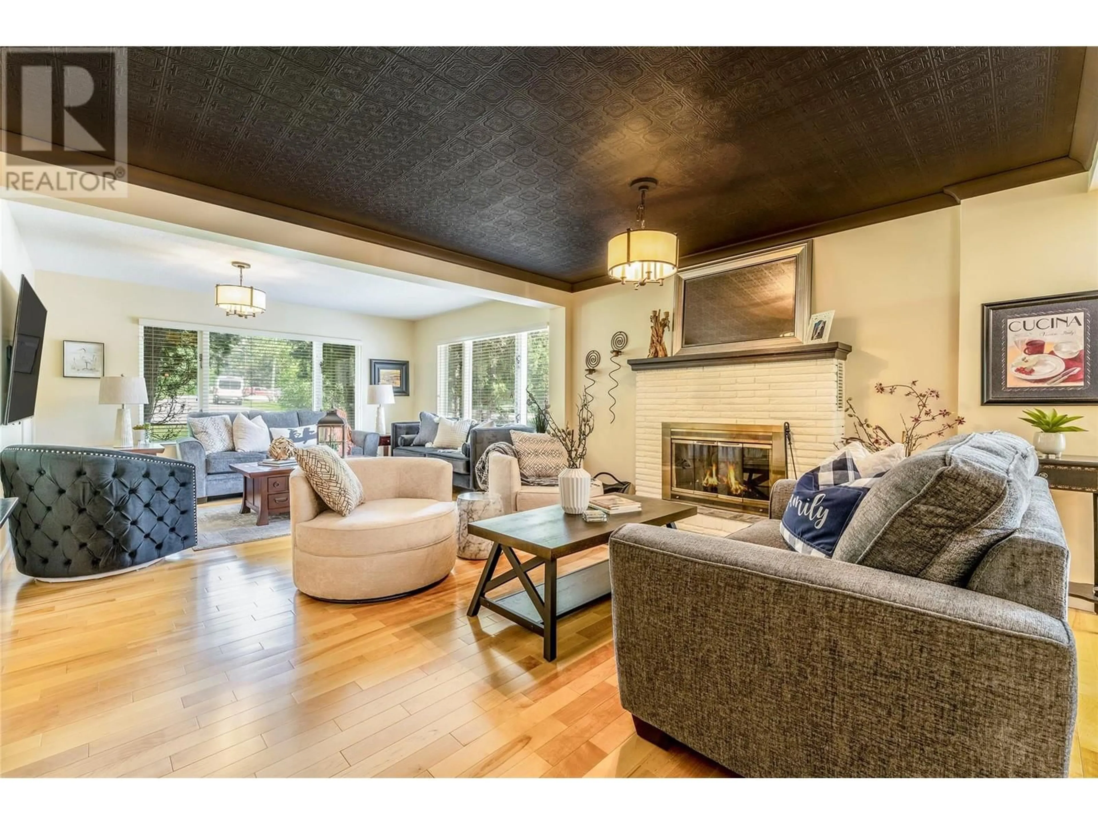 Living room with furniture, wood/laminate floor for 1795 VICTORIA Avenue, Windermere British Columbia V0B2L2