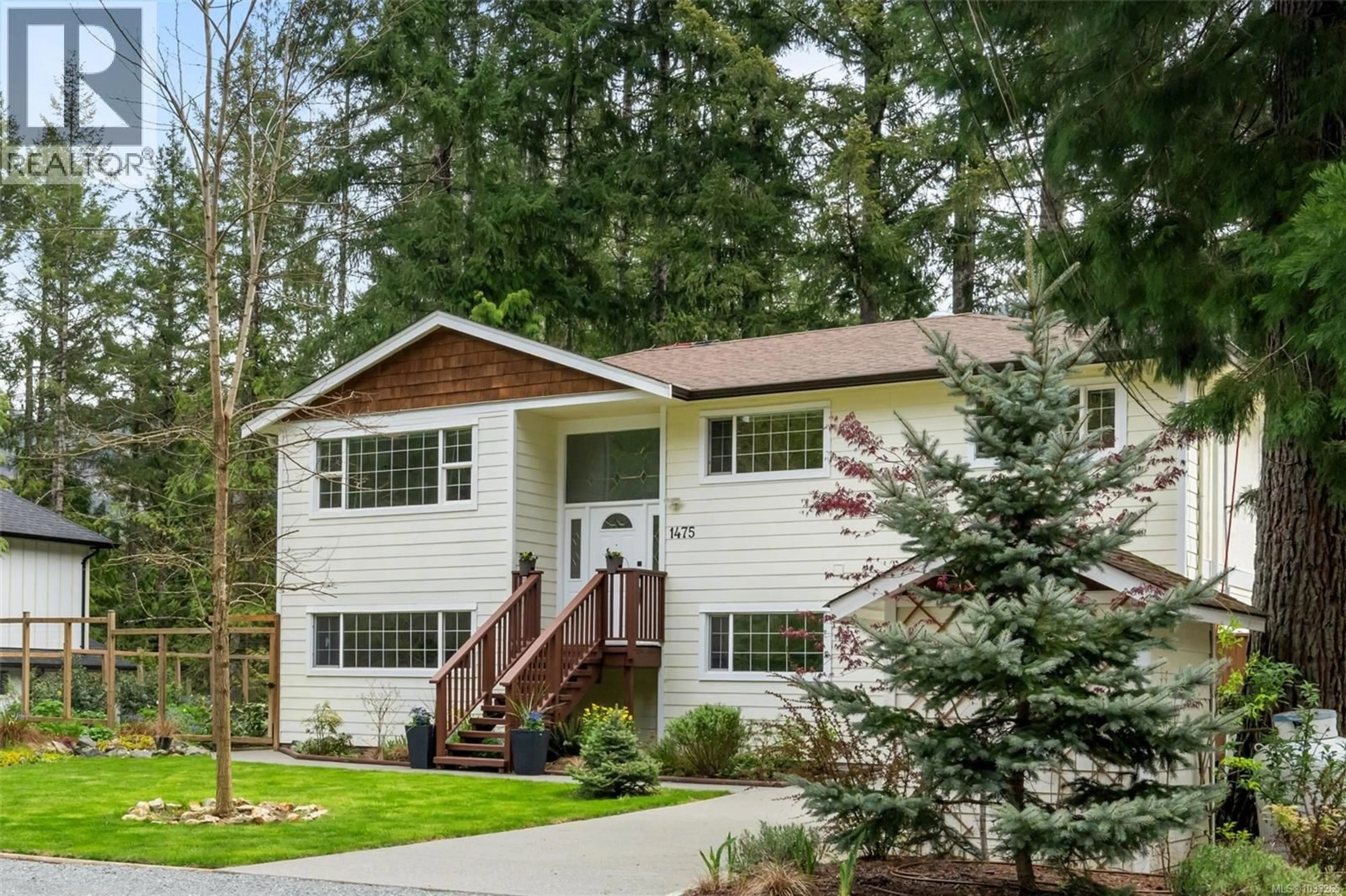 Home with vinyl exterior material, street for 1475 THARRATT ROAD, Shawnigan Lake British Columbia V8H2C3