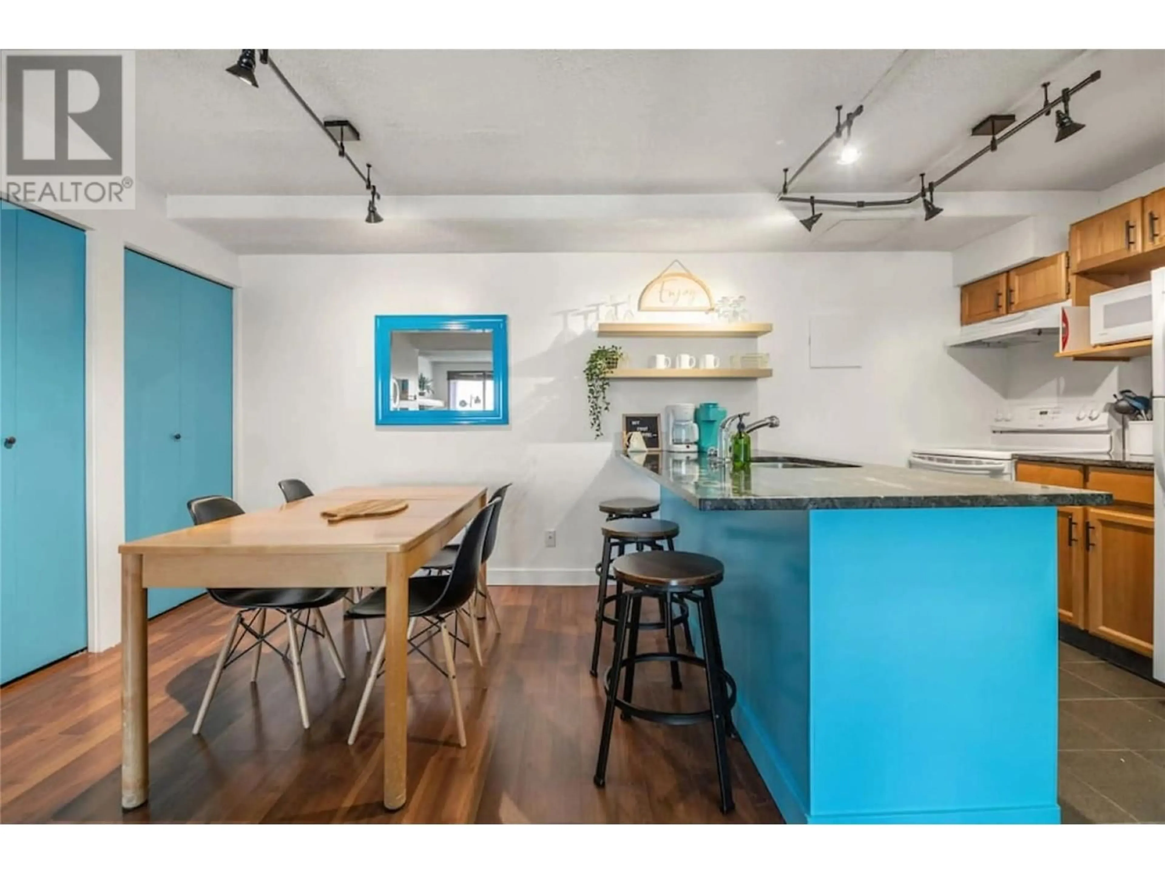 Open concept kitchen, wood/laminate floor for 504 - 2030 PANORAMA DRIVE, Panorama British Columbia V0A1T0