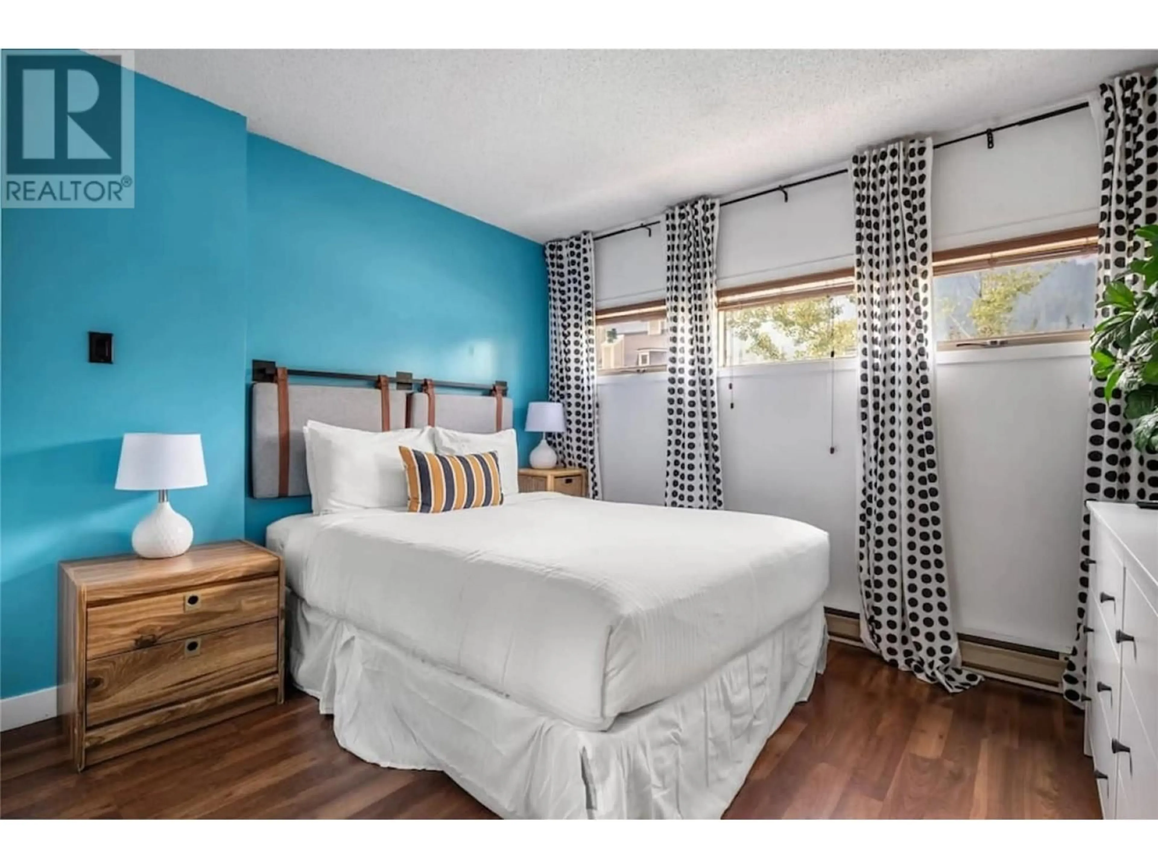 Bedroom with bed, wood/laminate floor for 504 - 2030 PANORAMA DRIVE, Panorama British Columbia V0A1T0
