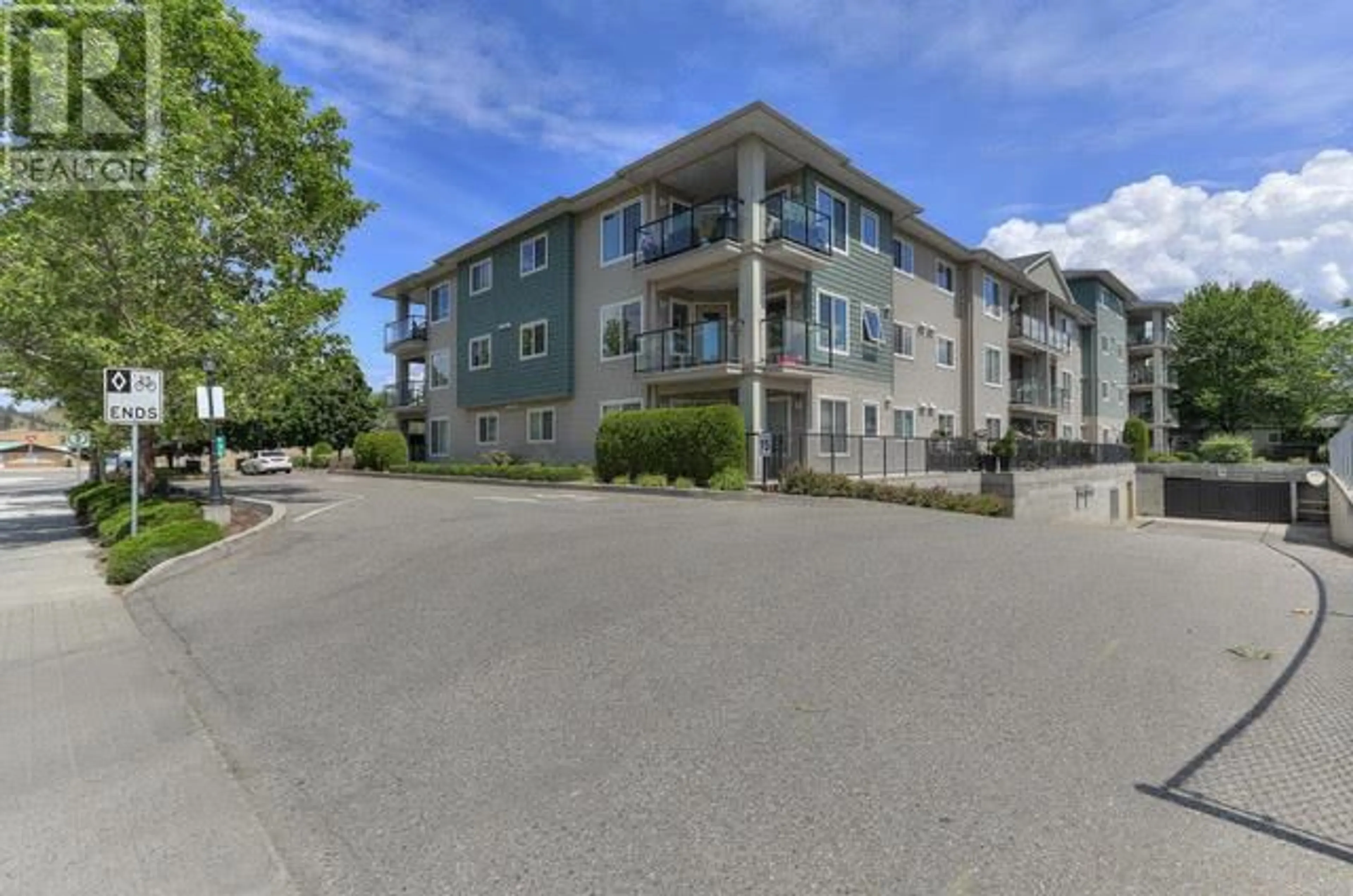 A pic from outside/outdoor area/front of a property/back of a property/a pic from drone, unknown for 135 Ziprick Road Unit# 414, Kelowna British Columbia V1X8B2