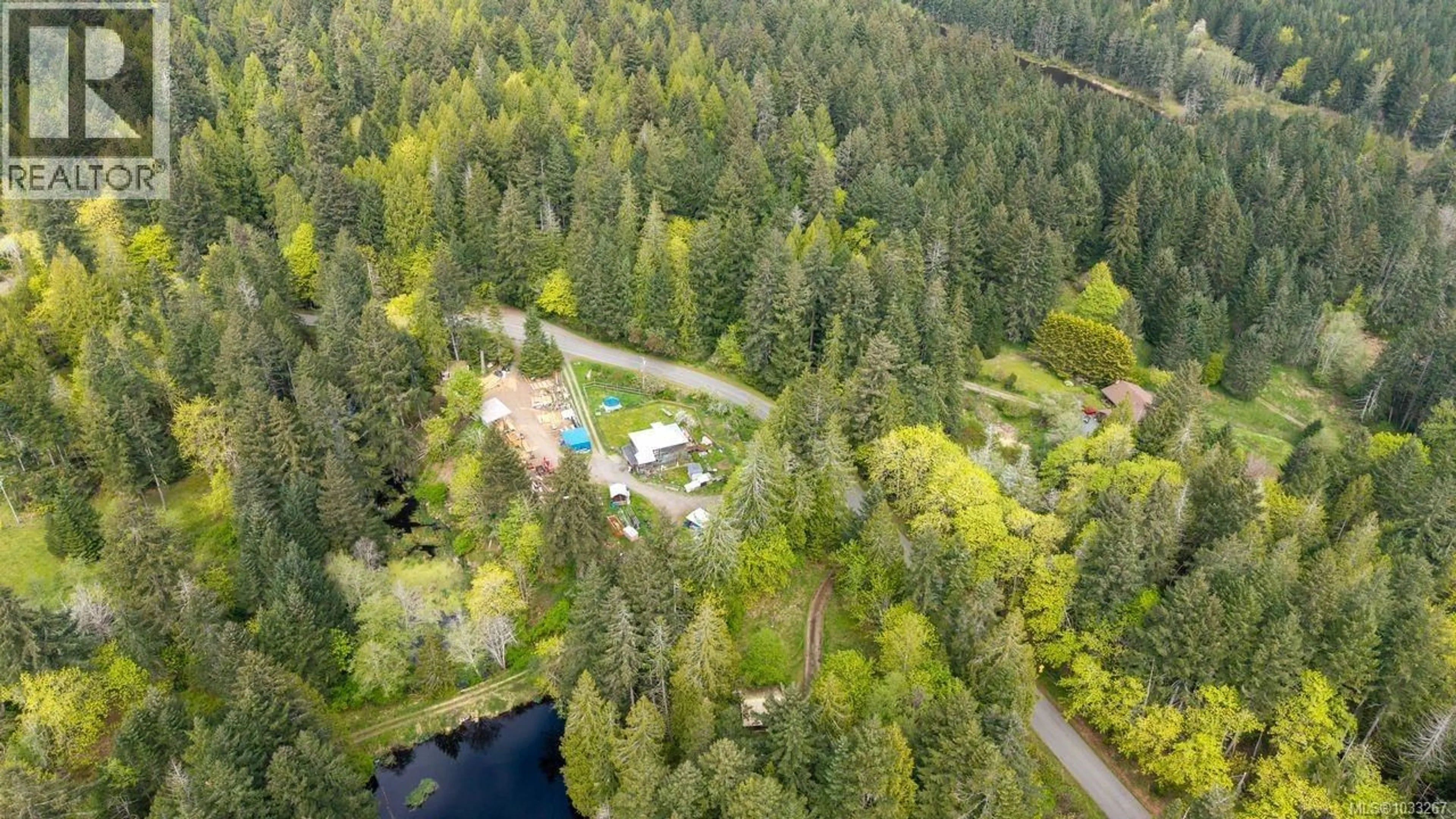 A pic from outside/outdoor area/front of a property/back of a property/a pic from drone, forest/trees view for 2761 TIESU ROAD, Nanaimo British Columbia V9X1W9