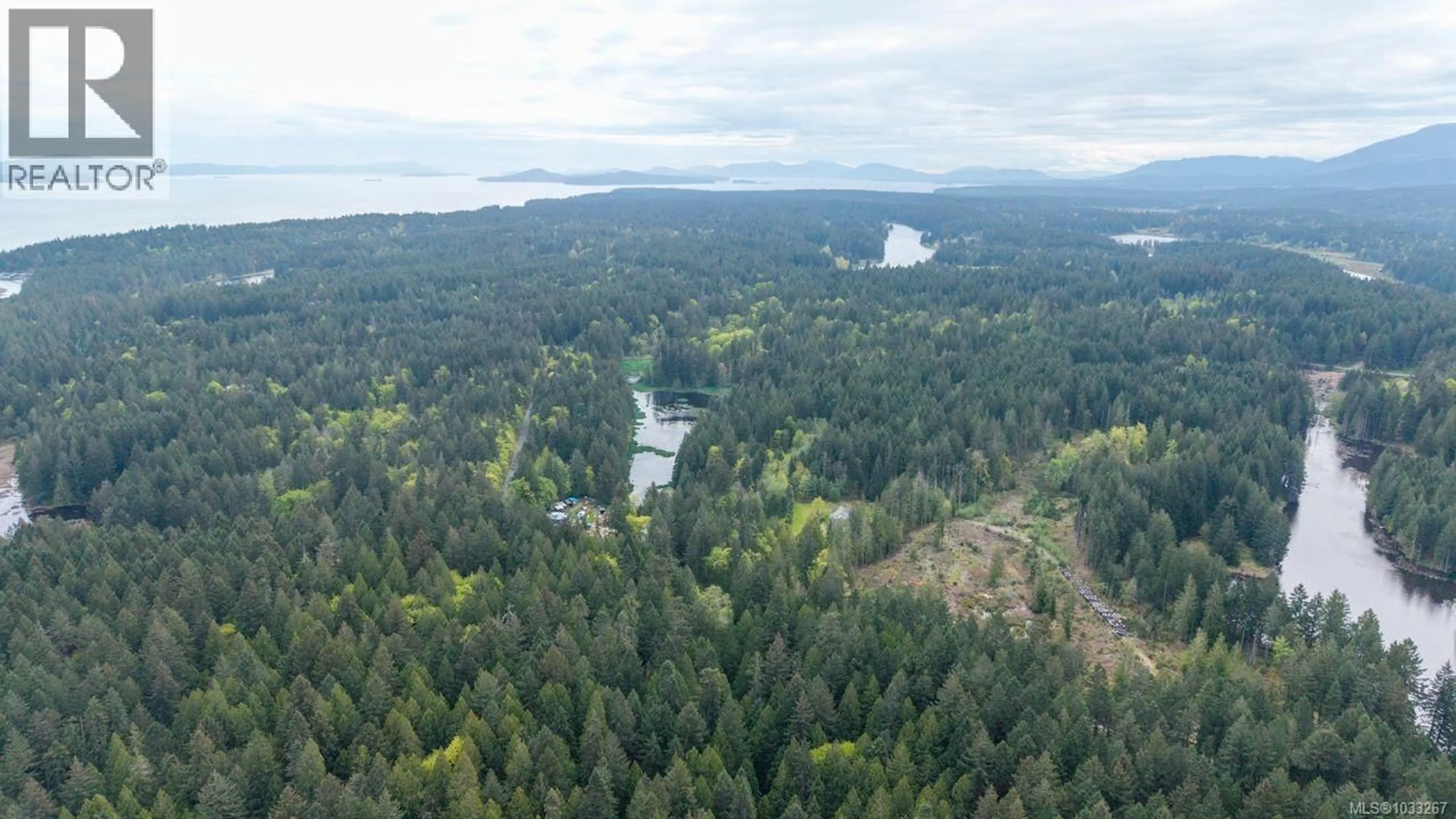 A pic from outside/outdoor area/front of a property/back of a property/a pic from drone, forest/trees view for 2761 TIESU ROAD, Nanaimo British Columbia V9X1W9