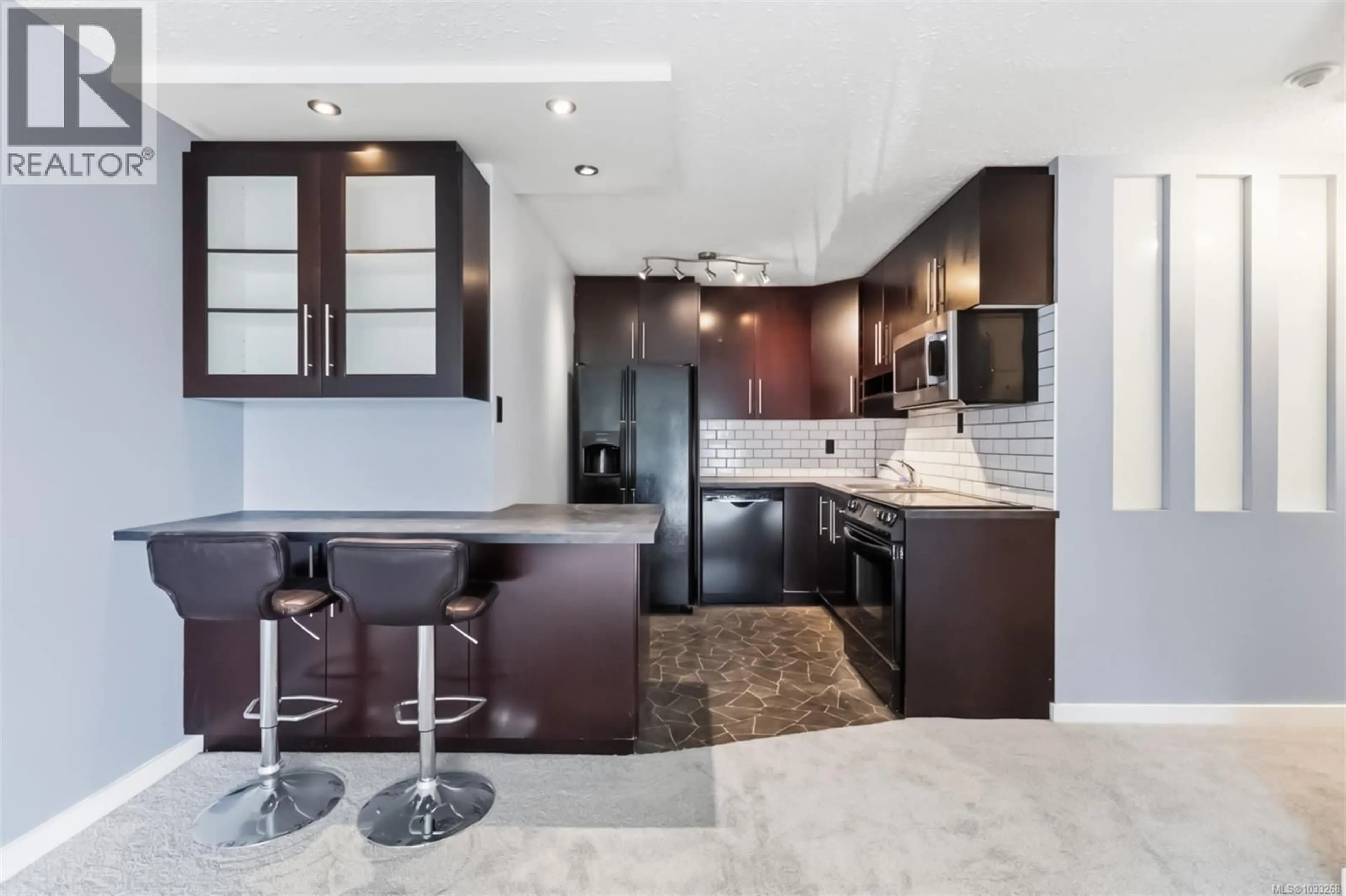 Contemporary kitchen, ceramic/tile floor for 305 - 900 TOLMIE AVENUE, Saanich British Columbia V8X3W6
