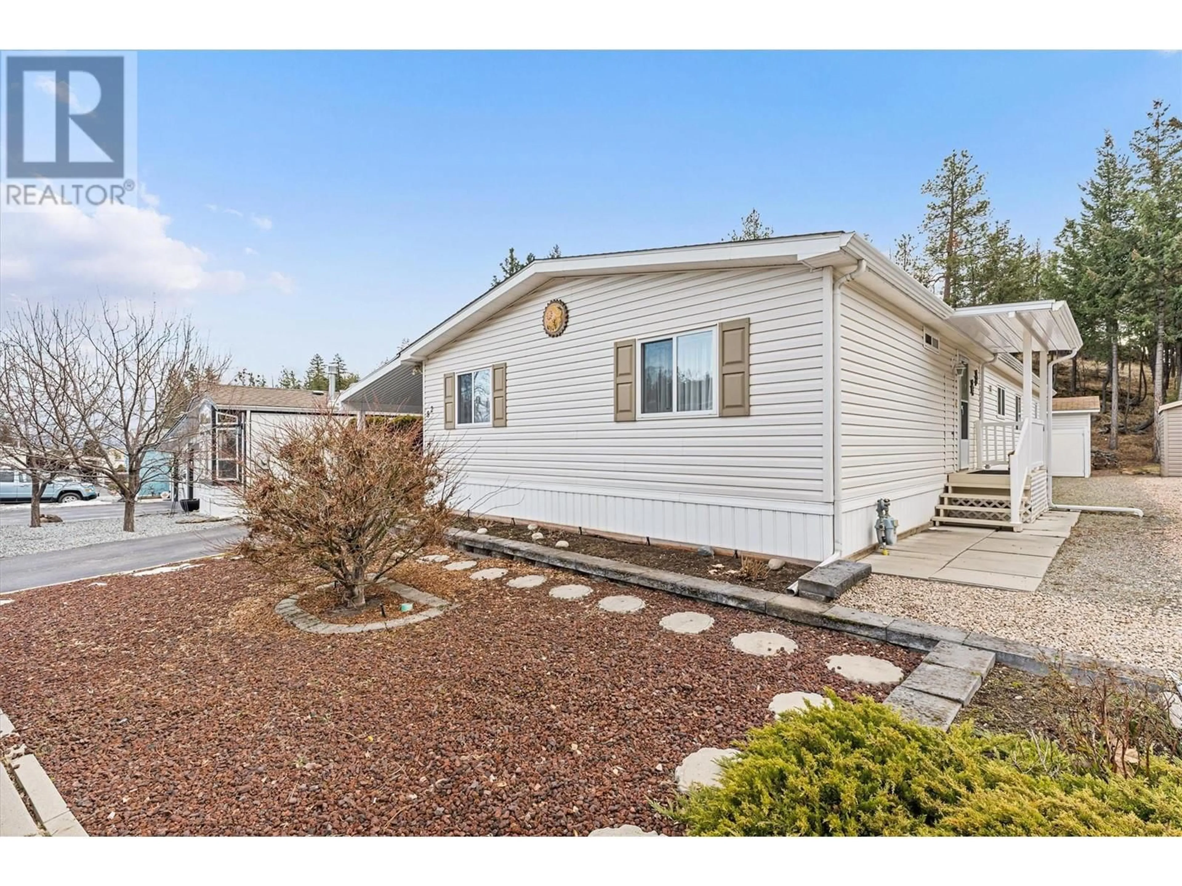 Home with vinyl exterior material, street for 1750 Lenz Road Unit# 82, West Kelowna British Columbia V1Z3N1