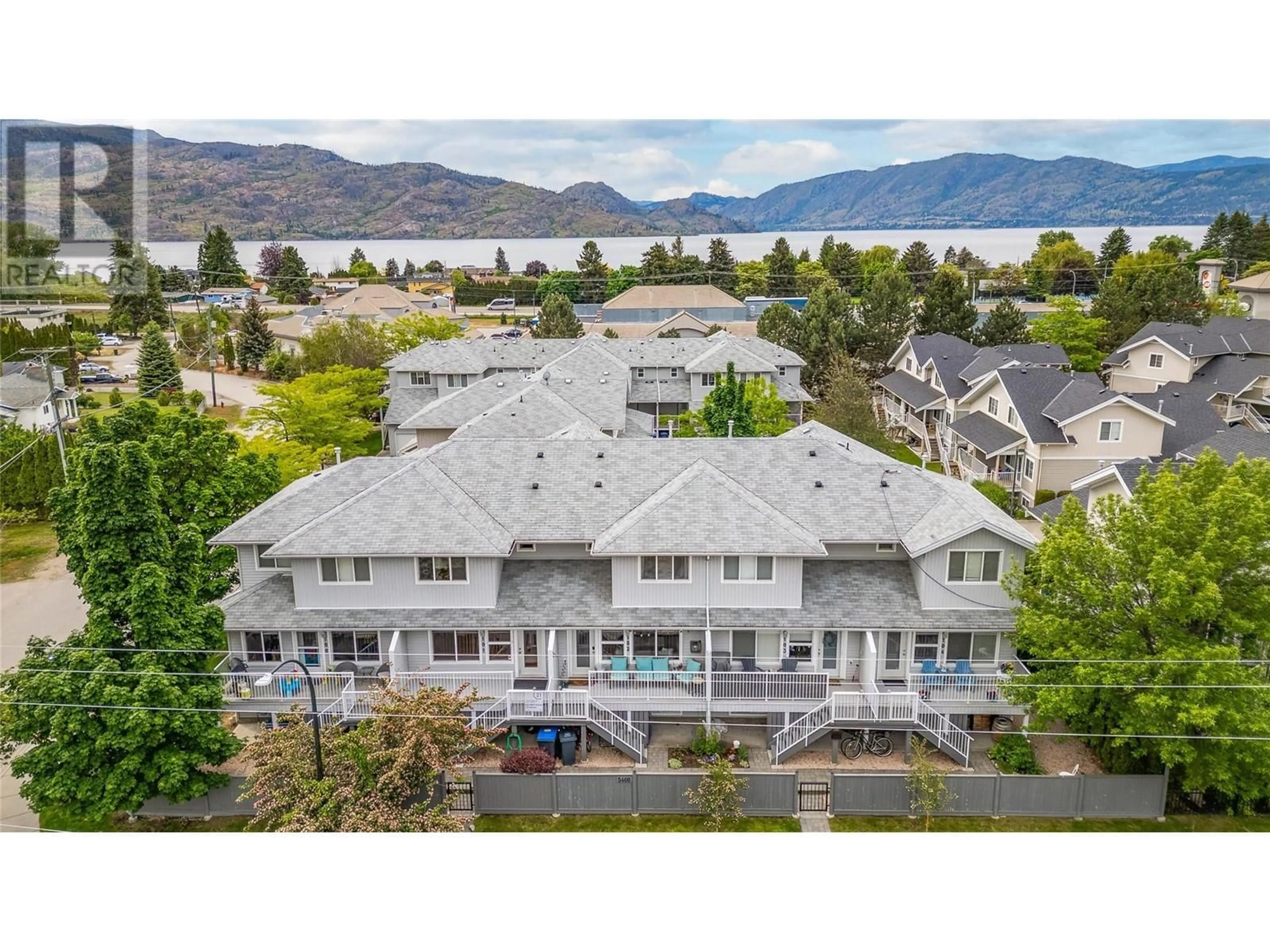 A pic from outside/outdoor area/front of a property/back of a property/a pic from drone, water/lake/river/ocean view for 5460 Clements Crescent Unit# 101, Peachland British Columbia V0H1X5