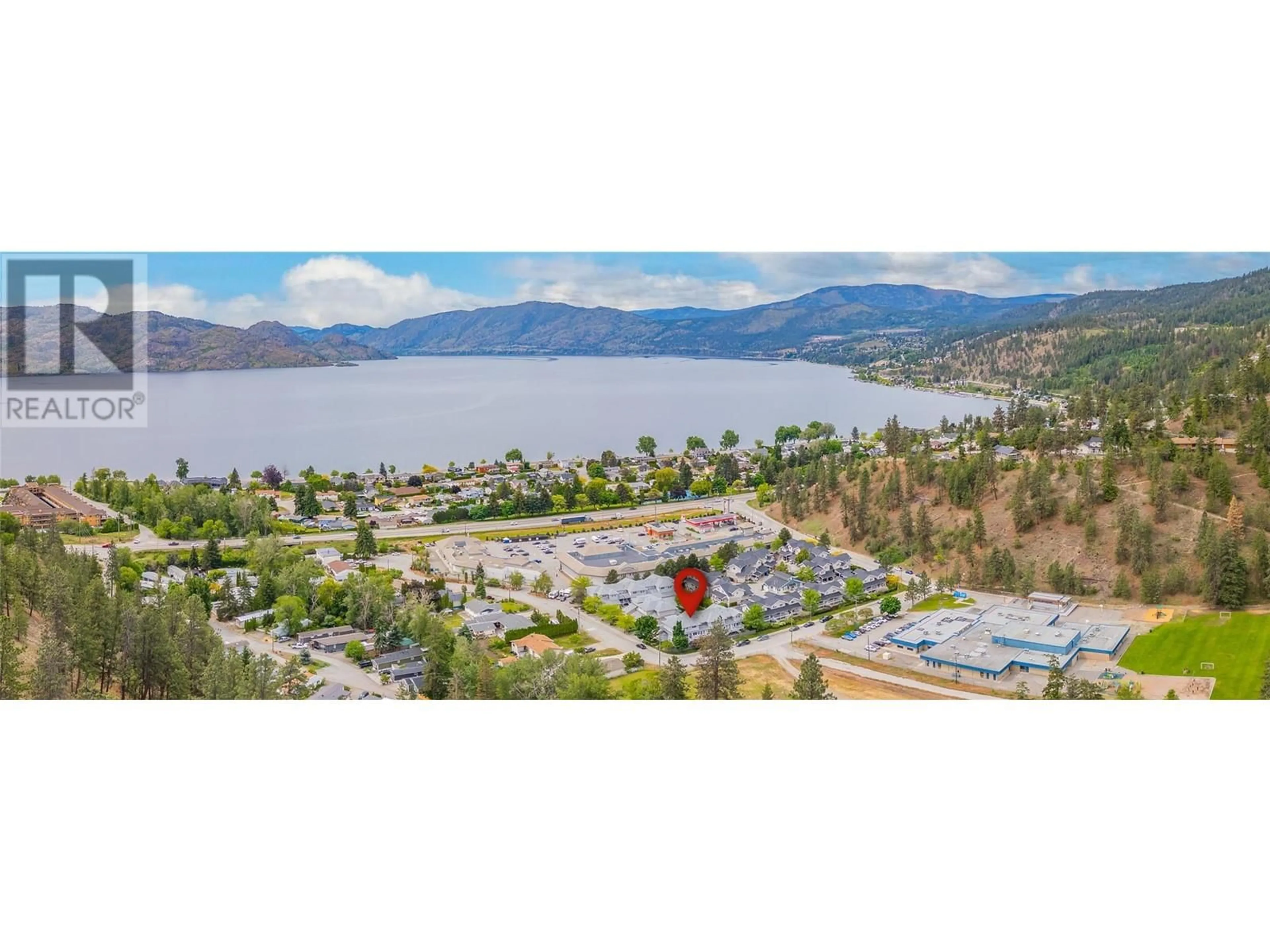 A pic from outside/outdoor area/front of a property/back of a property/a pic from drone, water/lake/river/ocean view for 5460 Clements Crescent Unit# 101, Peachland British Columbia V0H1X5