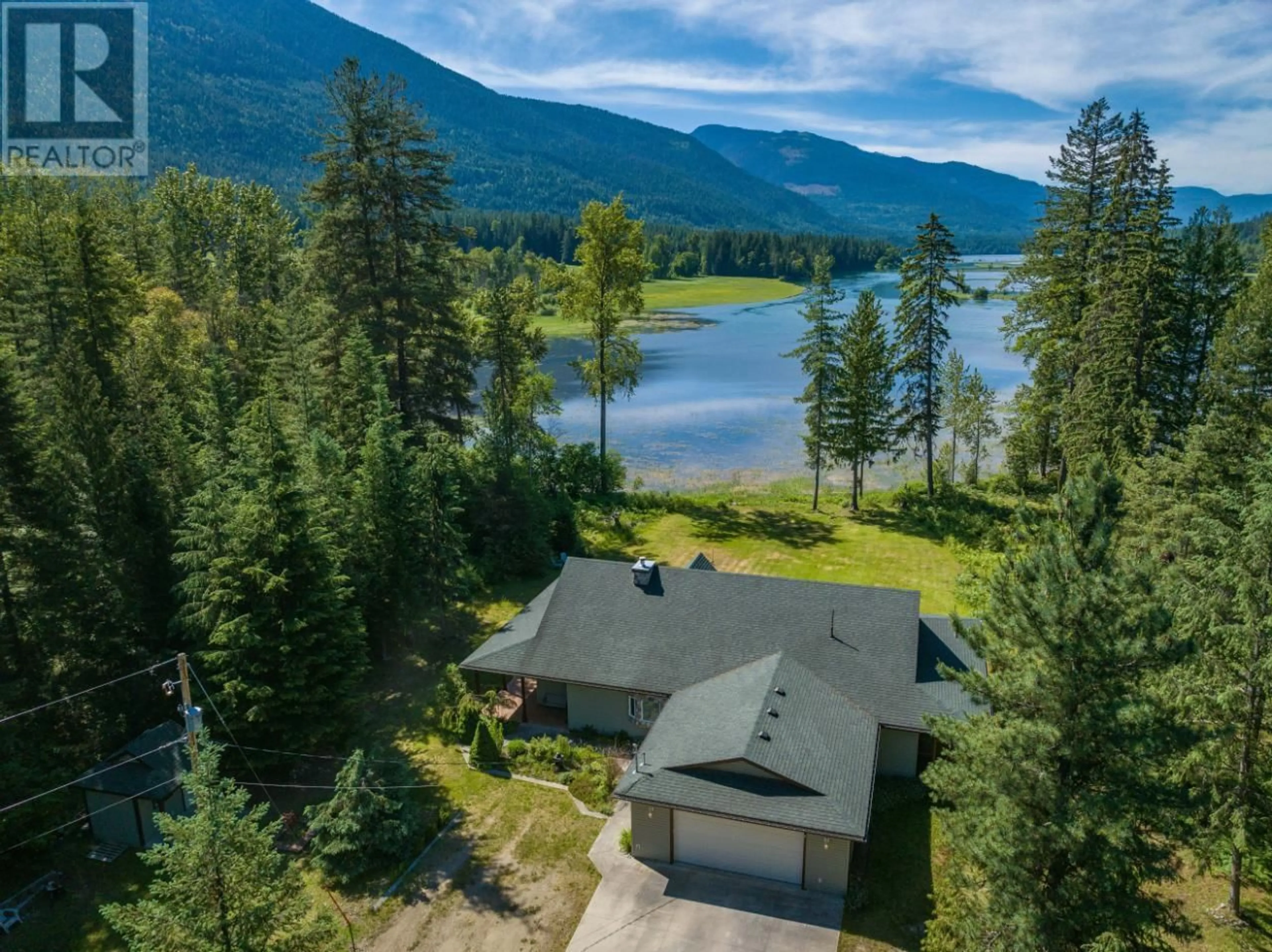 A pic from outside/outdoor area/front of a property/back of a property/a pic from drone, water/lake/river/ocean view for 8798 GRAVEL PIT Road, Slocan British Columbia V0G2C0