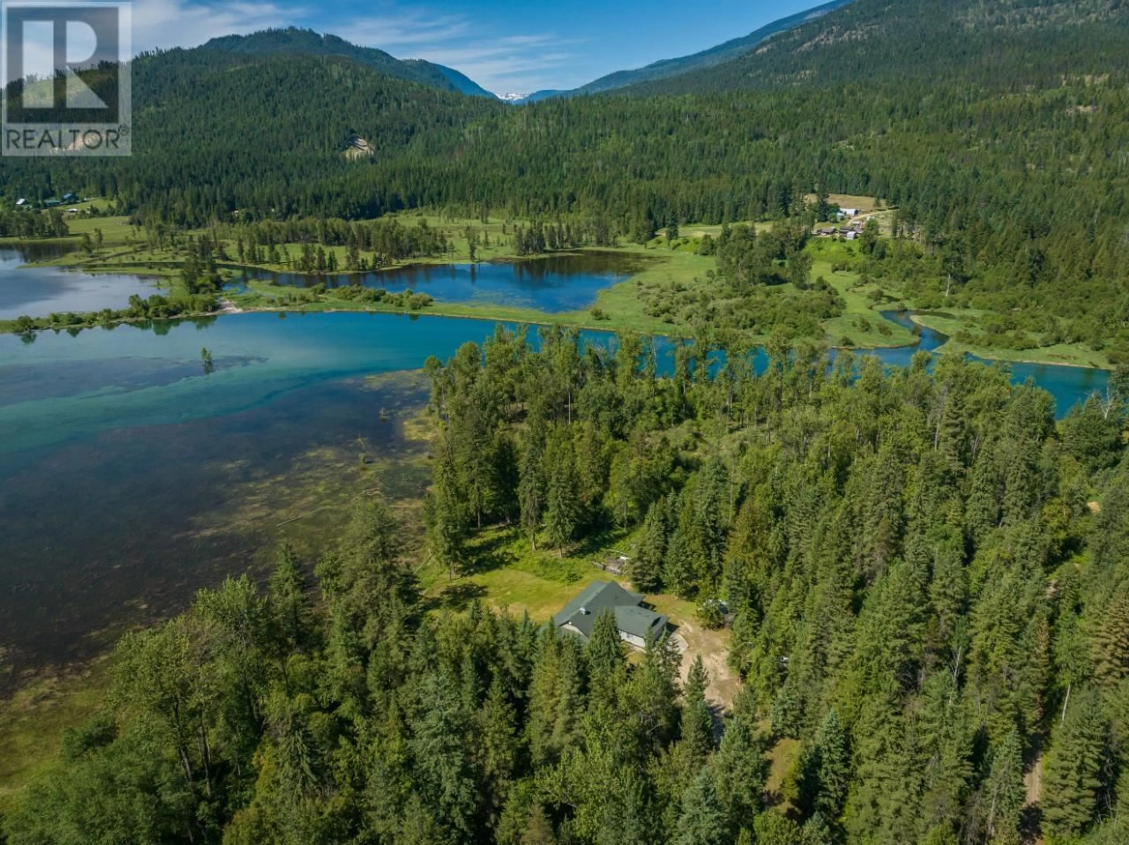 A pic from outside/outdoor area/front of a property/back of a property/a pic from drone, water/lake/river/ocean view for 8798 GRAVEL PIT Road, Slocan British Columbia V0G2C0