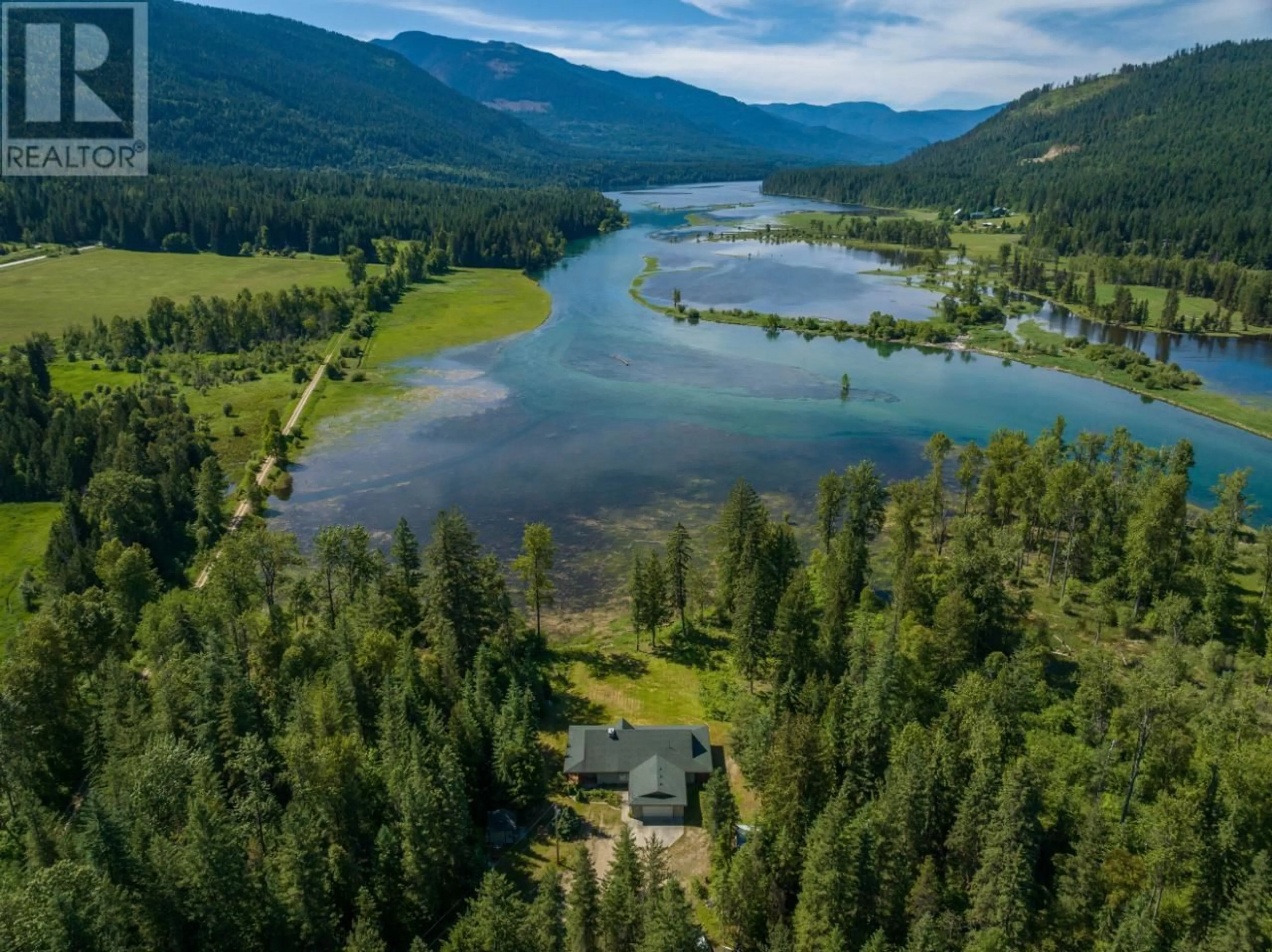 A pic from outside/outdoor area/front of a property/back of a property/a pic from drone, water/lake/river/ocean view for 8798 GRAVEL PIT Road, Slocan British Columbia V0G2C0