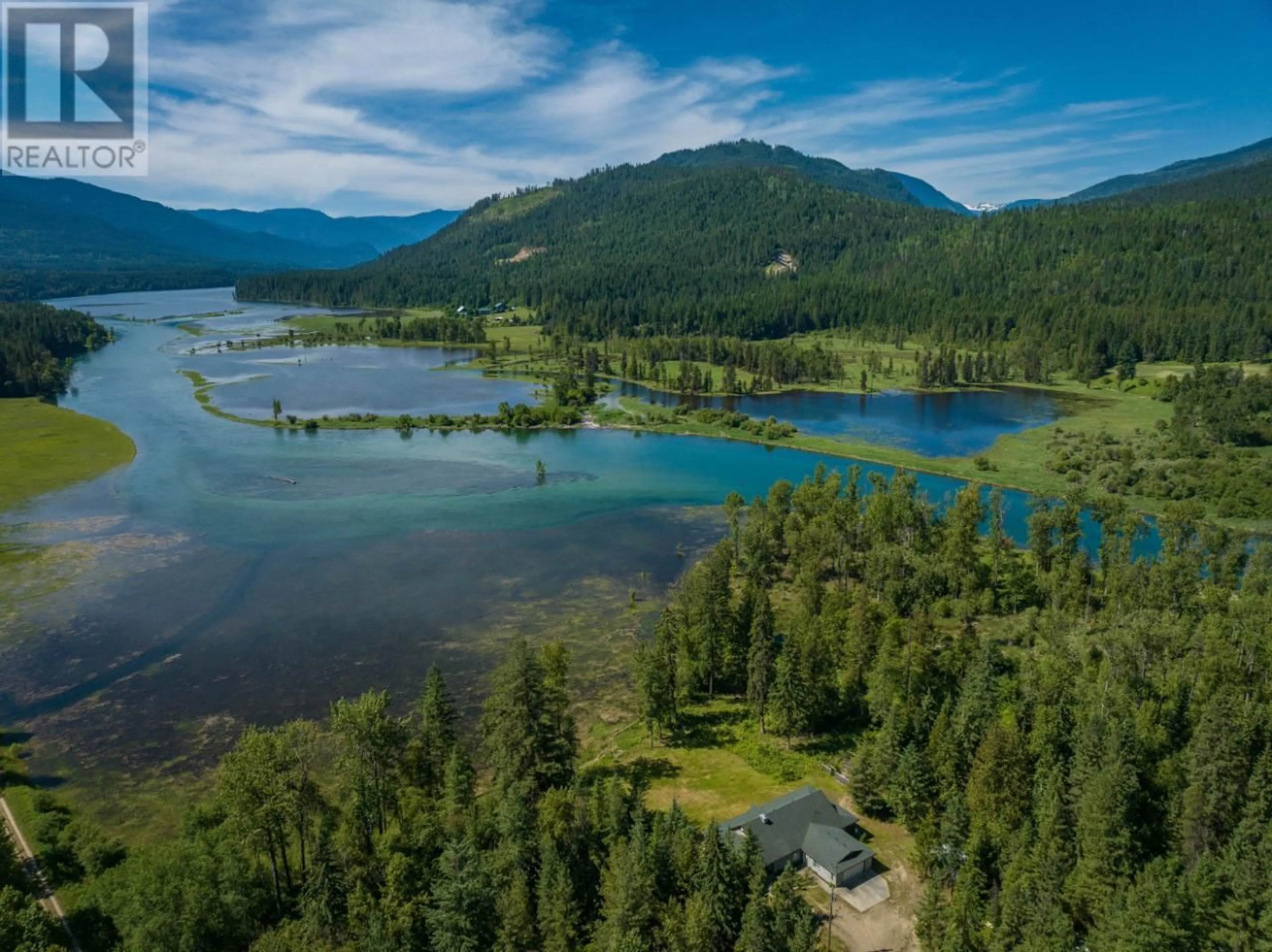 A pic from outside/outdoor area/front of a property/back of a property/a pic from drone, water/lake/river/ocean view for 8798 GRAVEL PIT Road, Slocan British Columbia V0G2C0