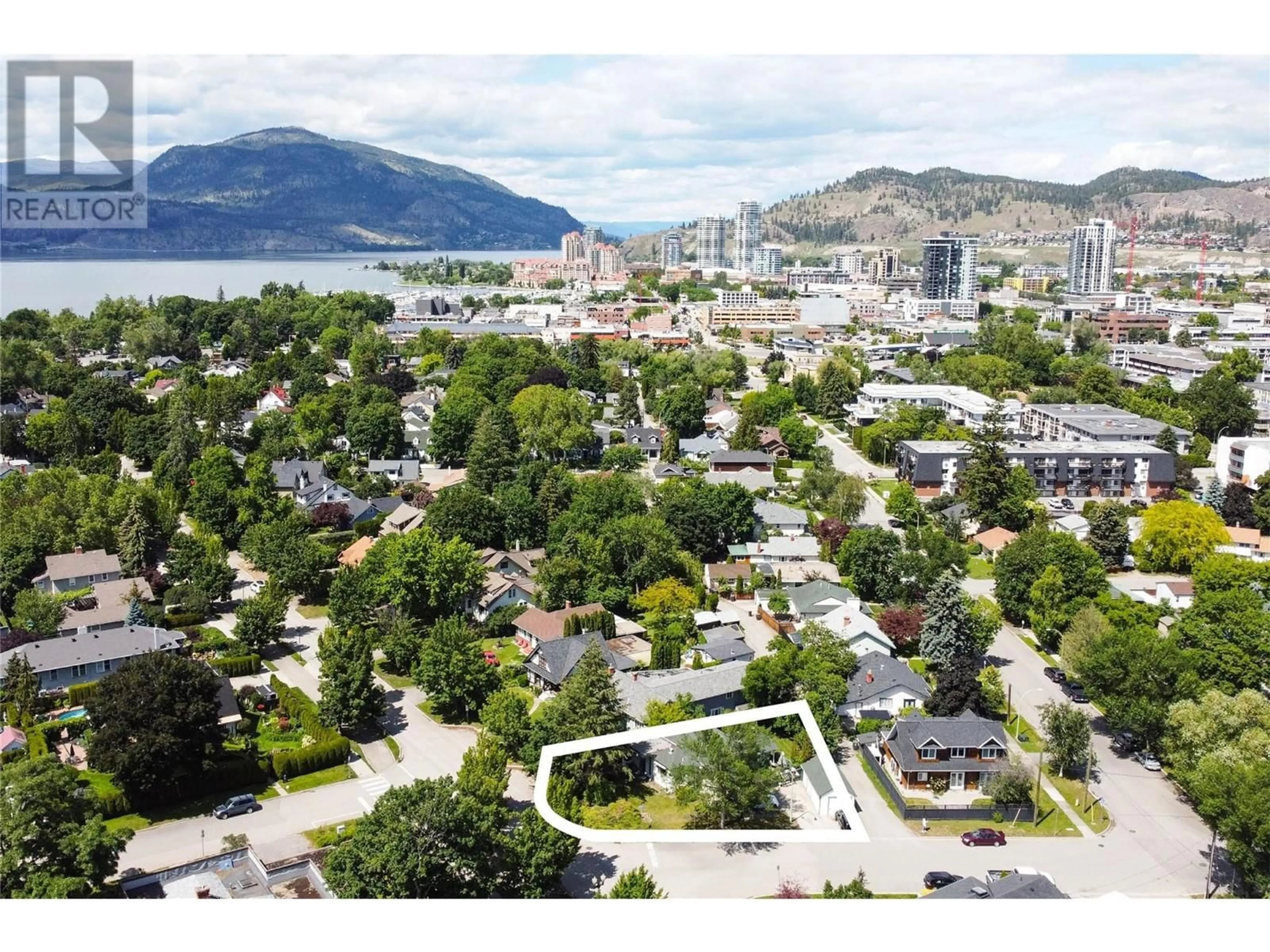 A pic from outside/outdoor area/front of a property/back of a property/a pic from drone, mountain view for 1967 Abbott Street, Kelowna British Columbia V1Y1B8