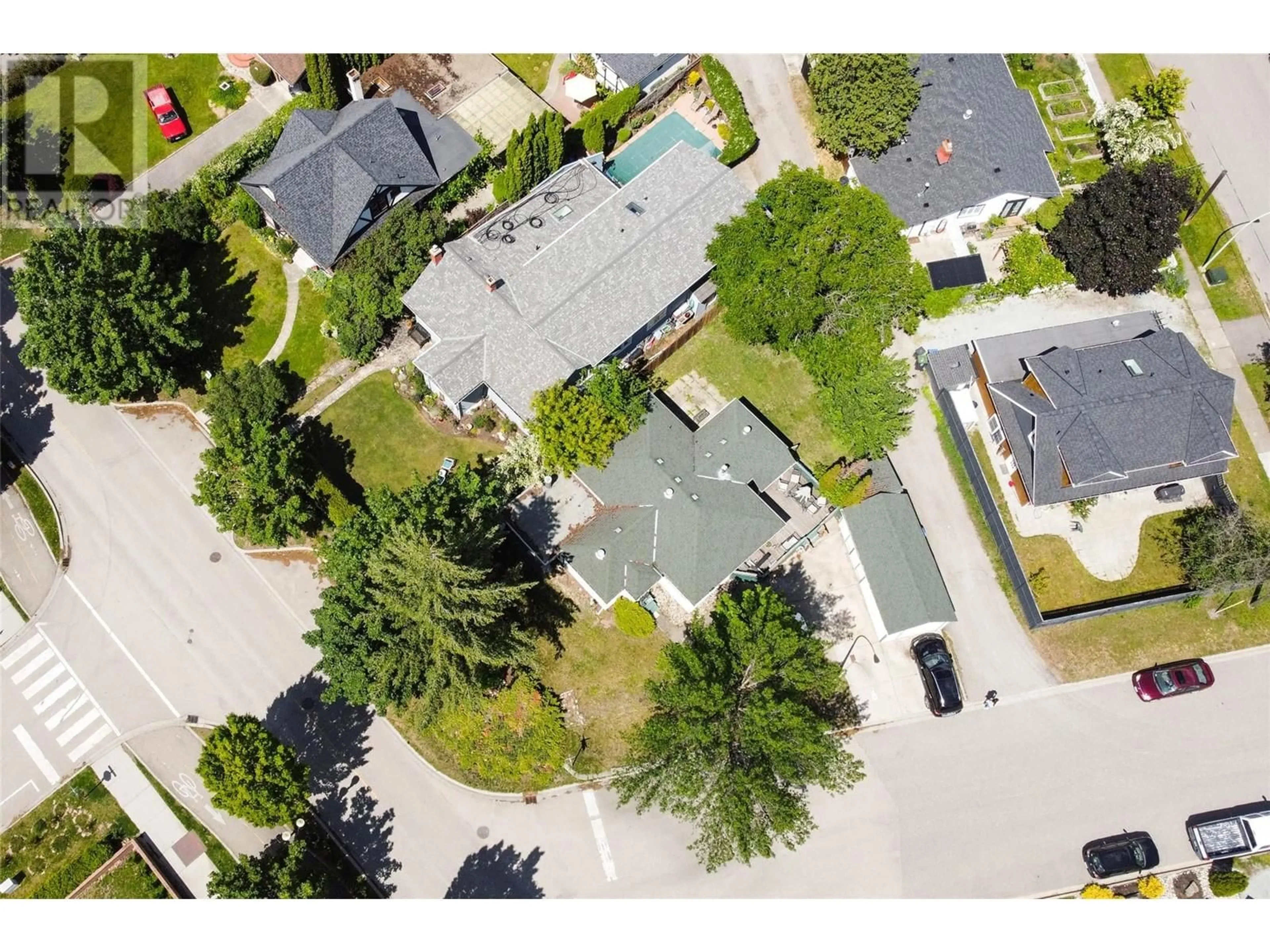 A pic from outside/outdoor area/front of a property/back of a property/a pic from drone, street for 1967 Abbott Street, Kelowna British Columbia V1Y1B8