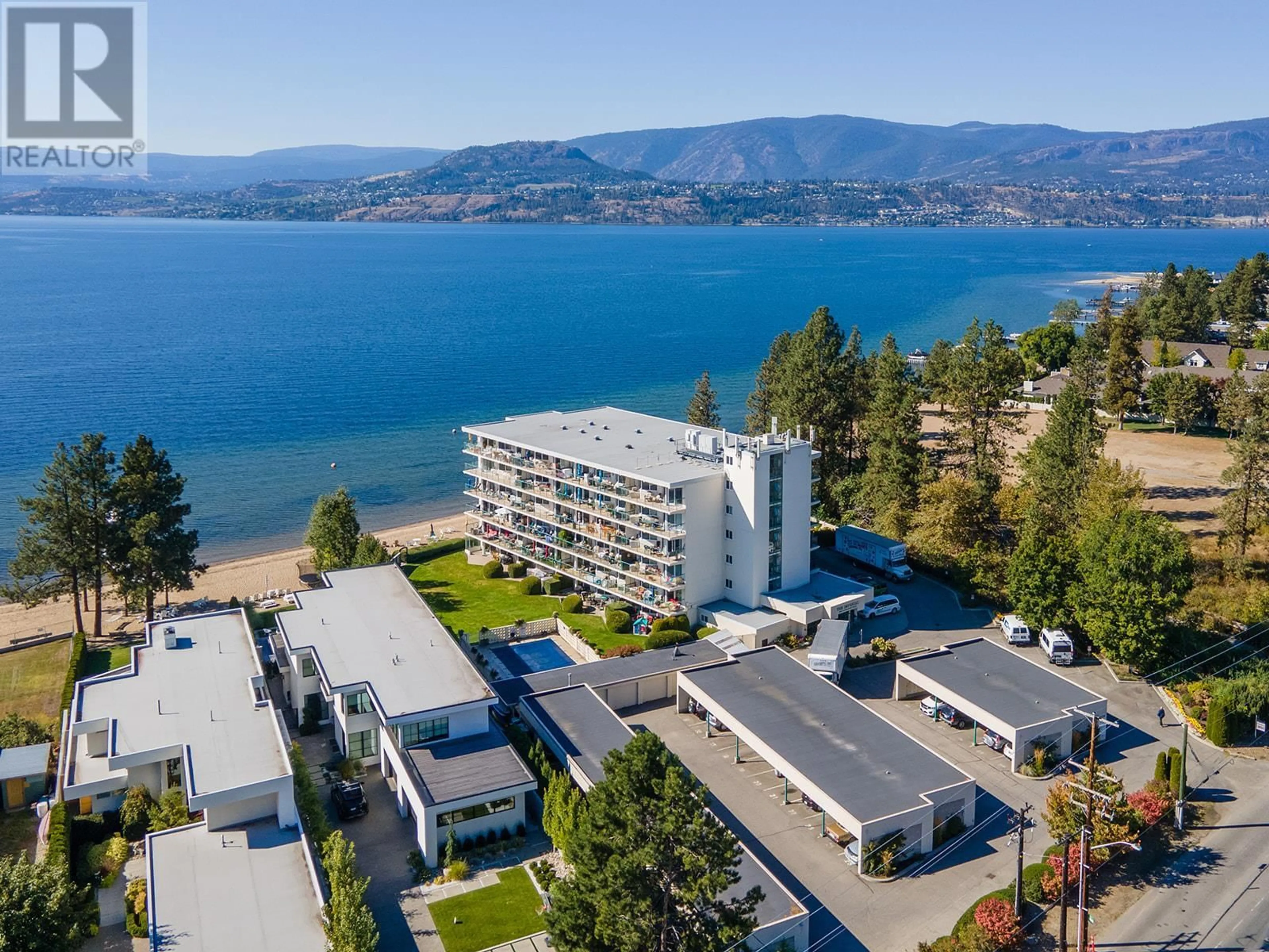 A pic from outside/outdoor area/front of a property/back of a property/a pic from drone, water/lake/river/ocean view for 4058 Lakeshore Road Unit# 506, Kelowna British Columbia V1W1V6