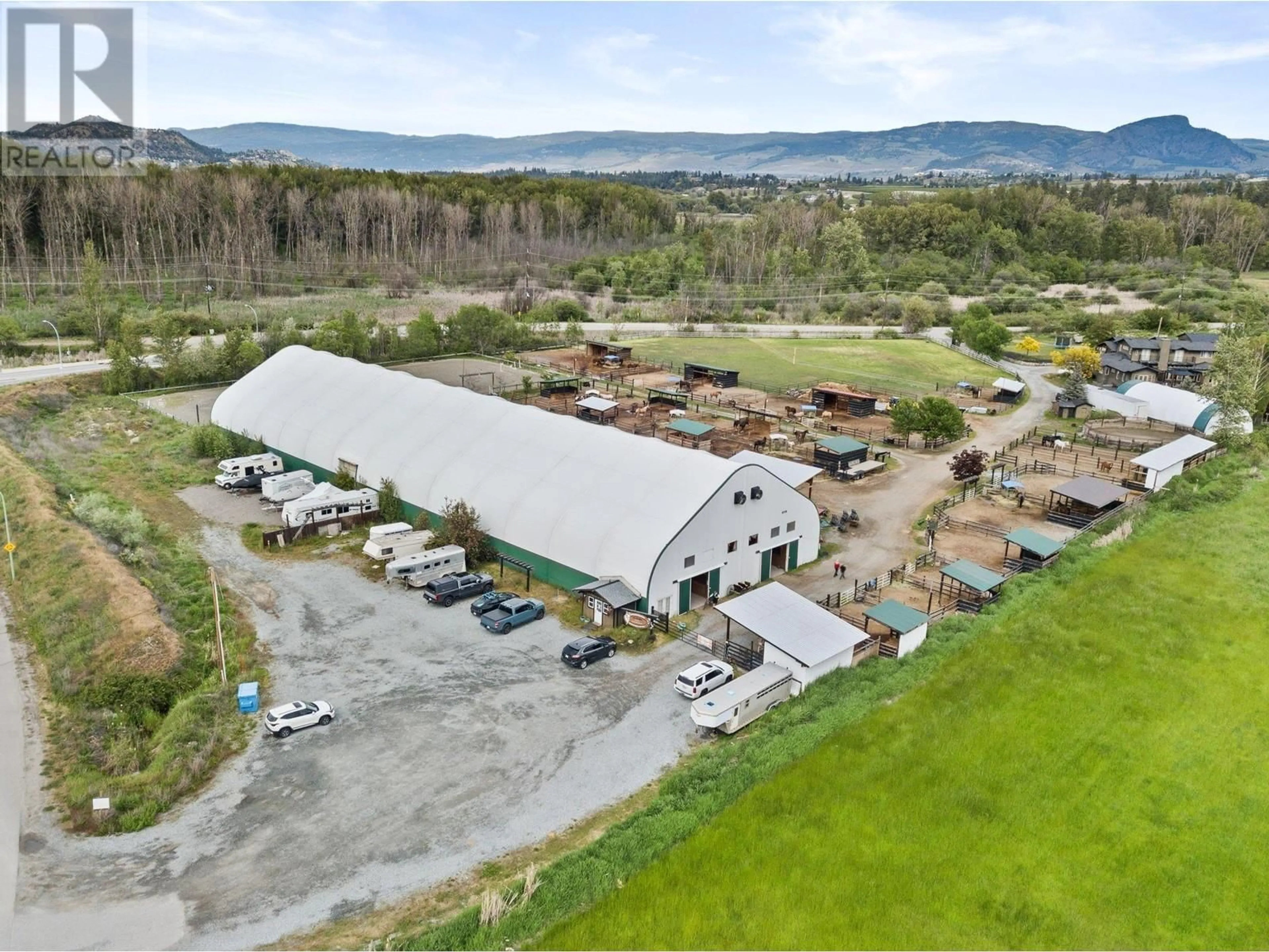 A pic from outside/outdoor area/front of a property/back of a property/a pic from drone, building for 3830 CASORSO ROAD, Kelowna British Columbia V1W4R7