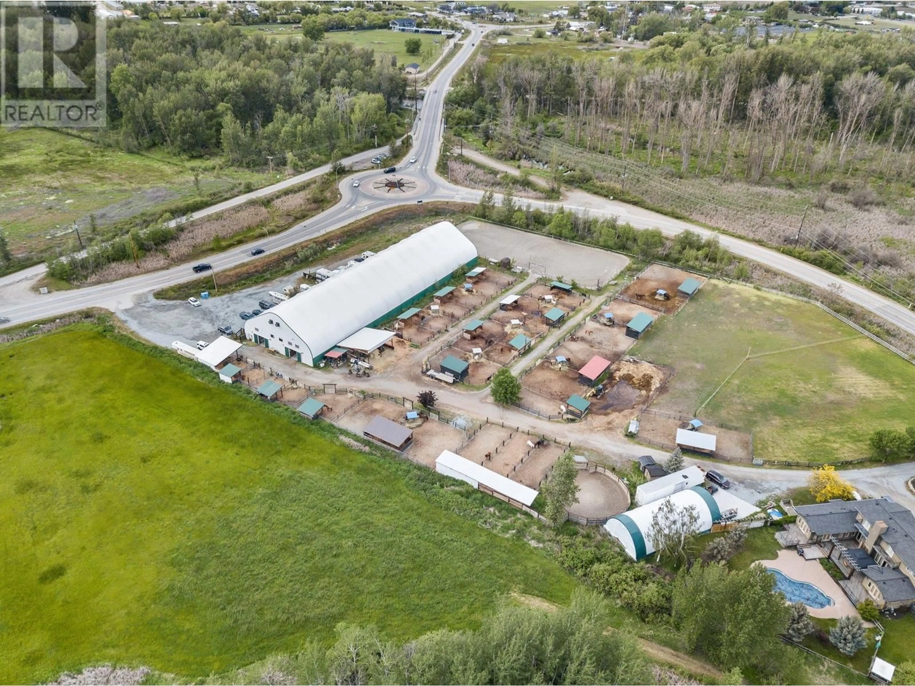 A pic from outside/outdoor area/front of a property/back of a property/a pic from drone, building for 3830 Casorso Road, Kelowna British Columbia V1W4R7