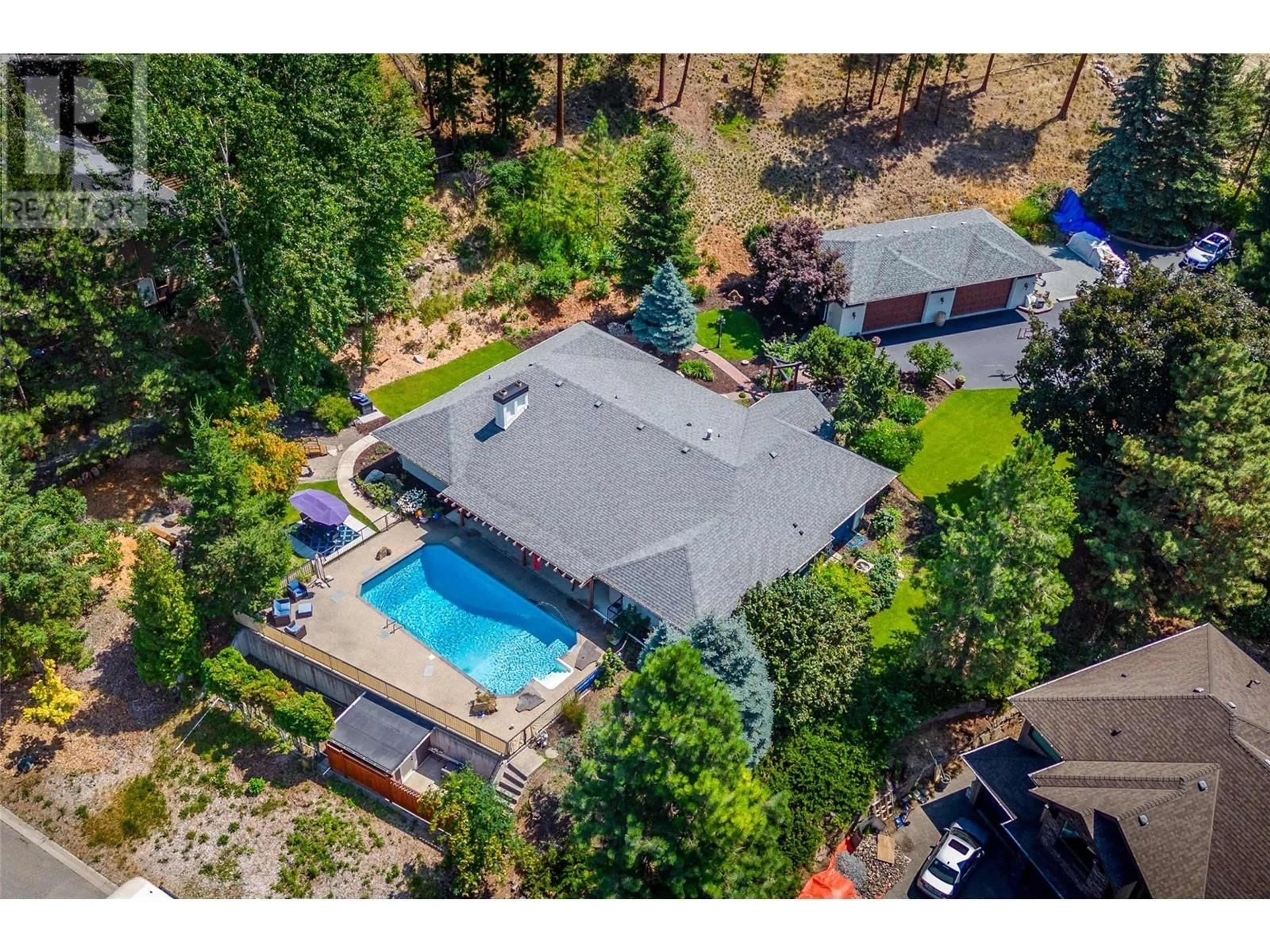 A pic from outside/outdoor area/front of a property/back of a property/a pic from drone, unknown for 514 Hawes Court, Kelowna British Columbia V1W4A7