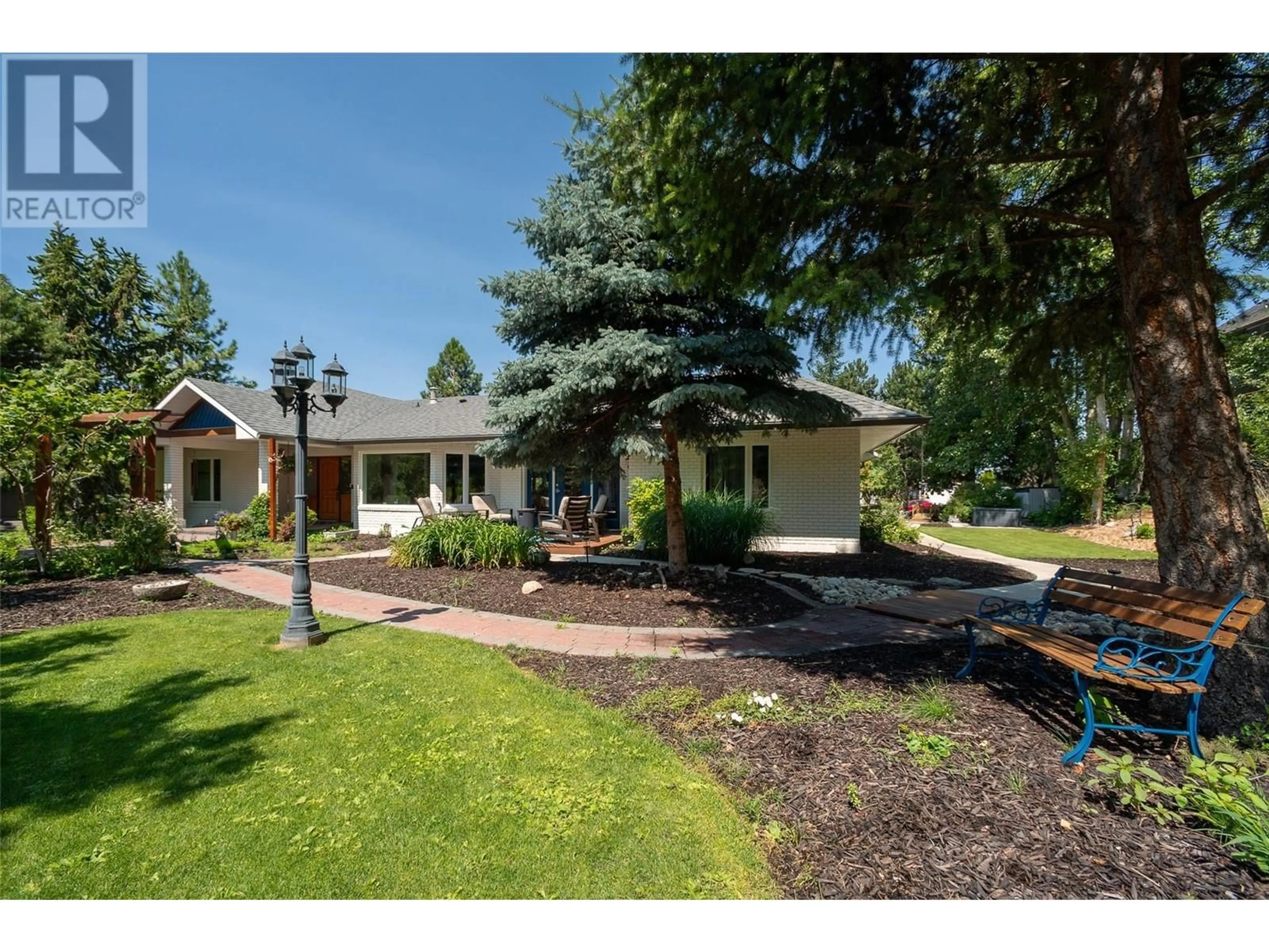 A pic from outside/outdoor area/front of a property/back of a property/a pic from drone, street for 514 Hawes Court, Kelowna British Columbia V1W4A7