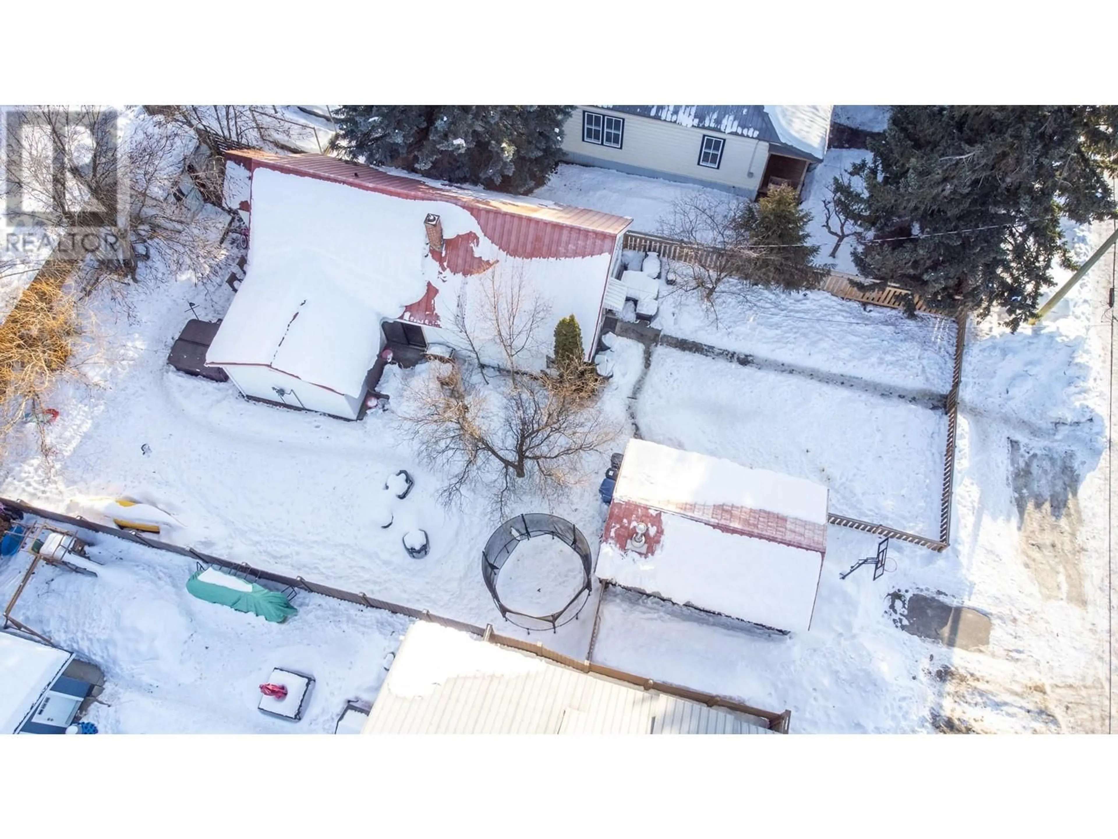 A pic from outside/outdoor area/front of a property/back of a property/a pic from drone, street for 1062 4th Avenue, Fernie British Columbia V0B1M0