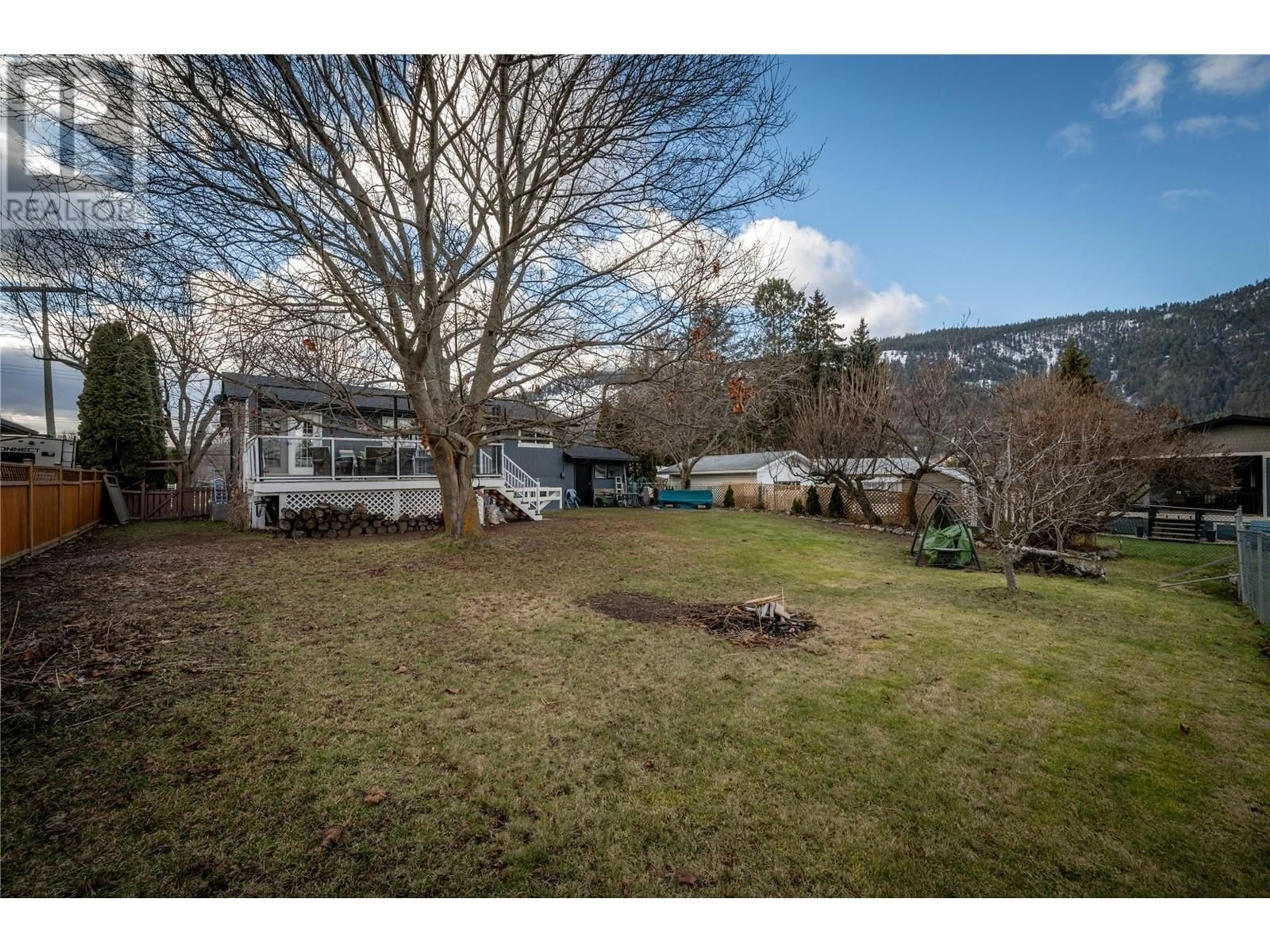 A pic from outside/outdoor area/front of a property/back of a property/a pic from drone, unknown for 527 Pine Street, Chase British Columbia V0M1M0