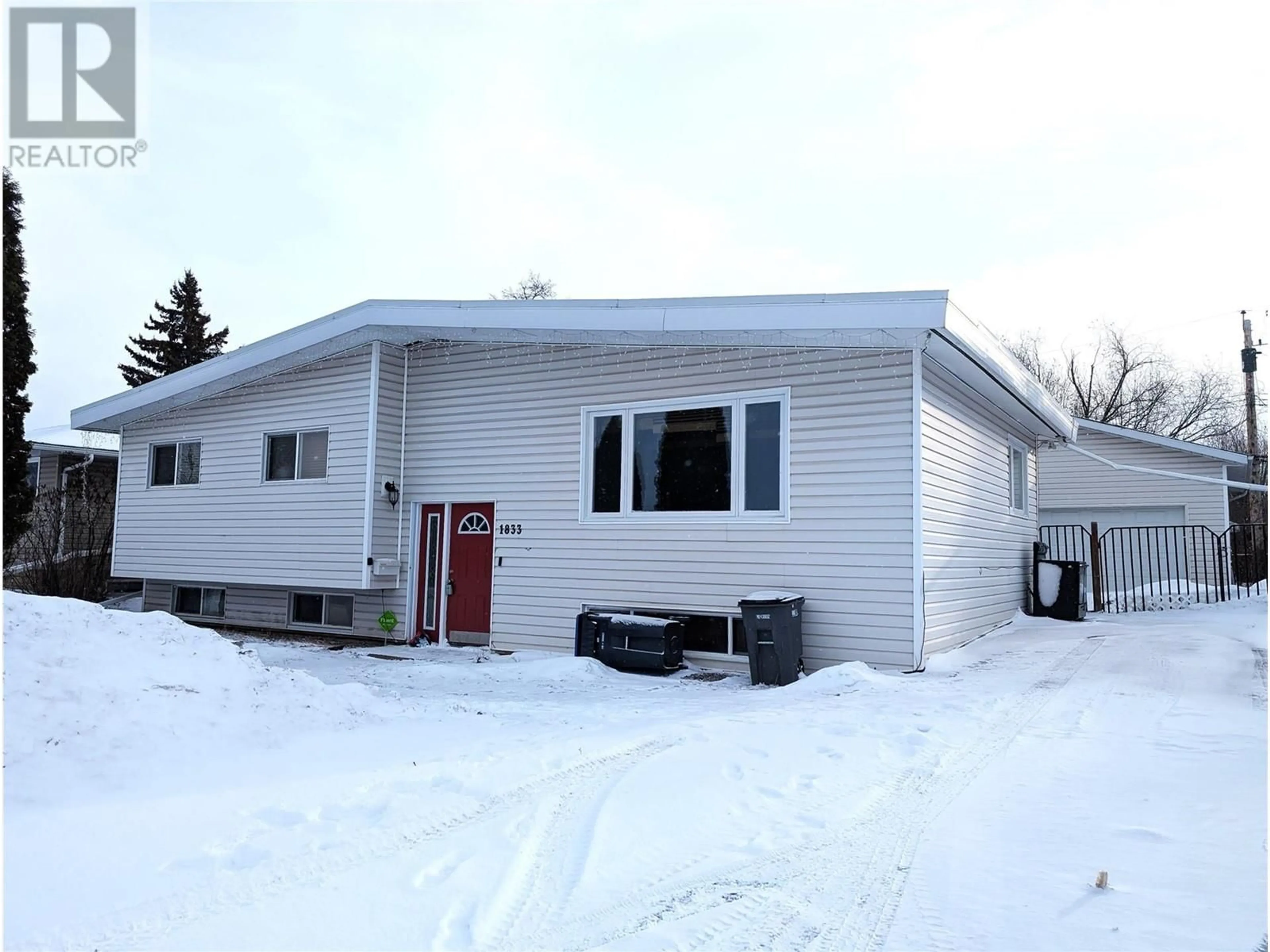 Home with vinyl exterior material, street for 1833 Aspen Drive, Dawson Creek British Columbia V1G2S5