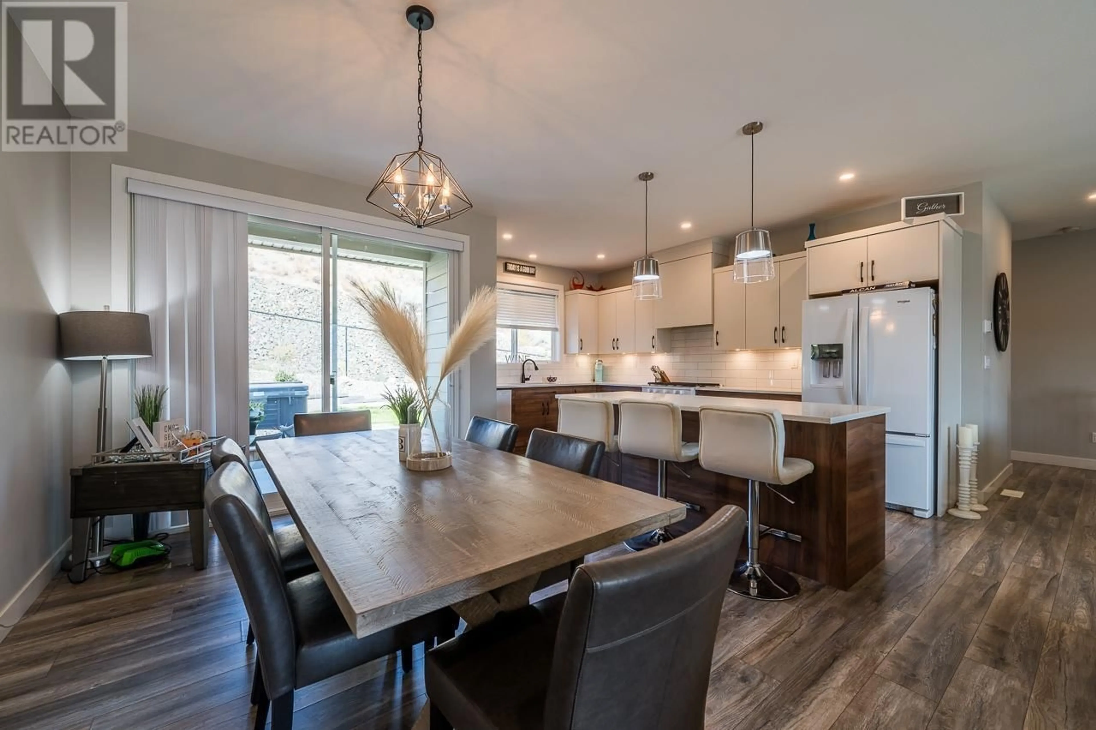 Open concept kitchen, wood/laminate floor for 2265 GRASSLANDS Boulevard, Kamloops British Columbia V2B0E3