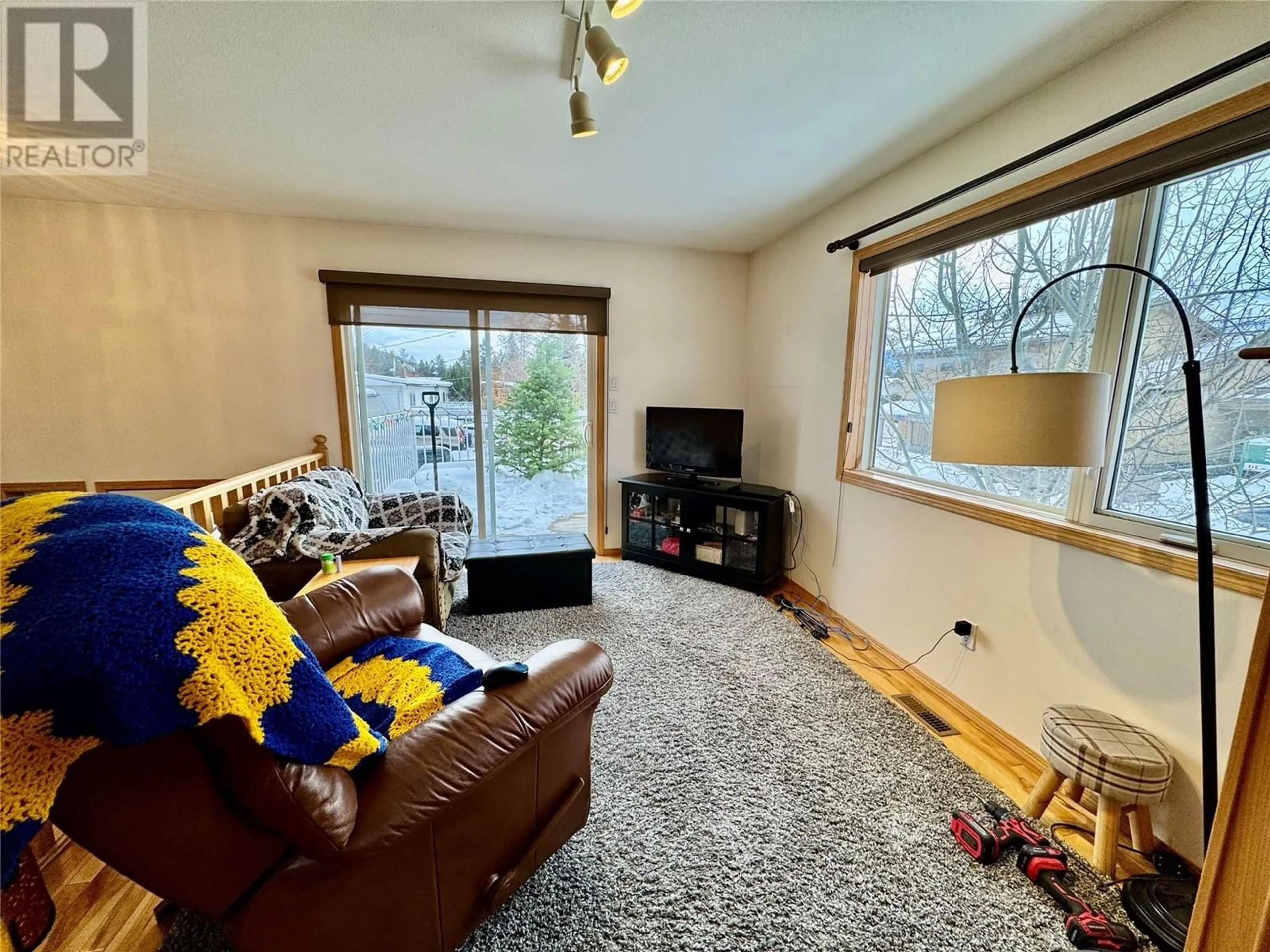 Living room with furniture, unknown for 7506 COLUMBIA AVENUE, Radium Hot Springs British Columbia V0A1M0